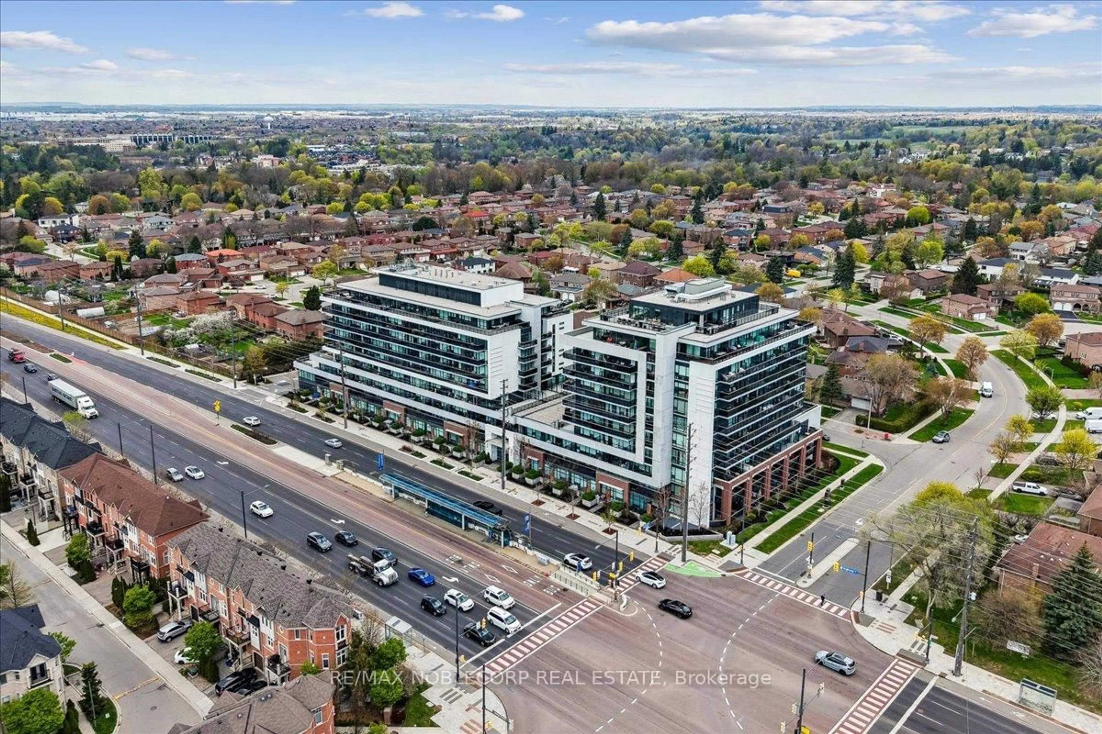 A pic from outside/outdoor area/front of a property/back of a property/a pic from drone, building for 4800 Highway 7 #503, Vaughan Ontario L4L 1H8