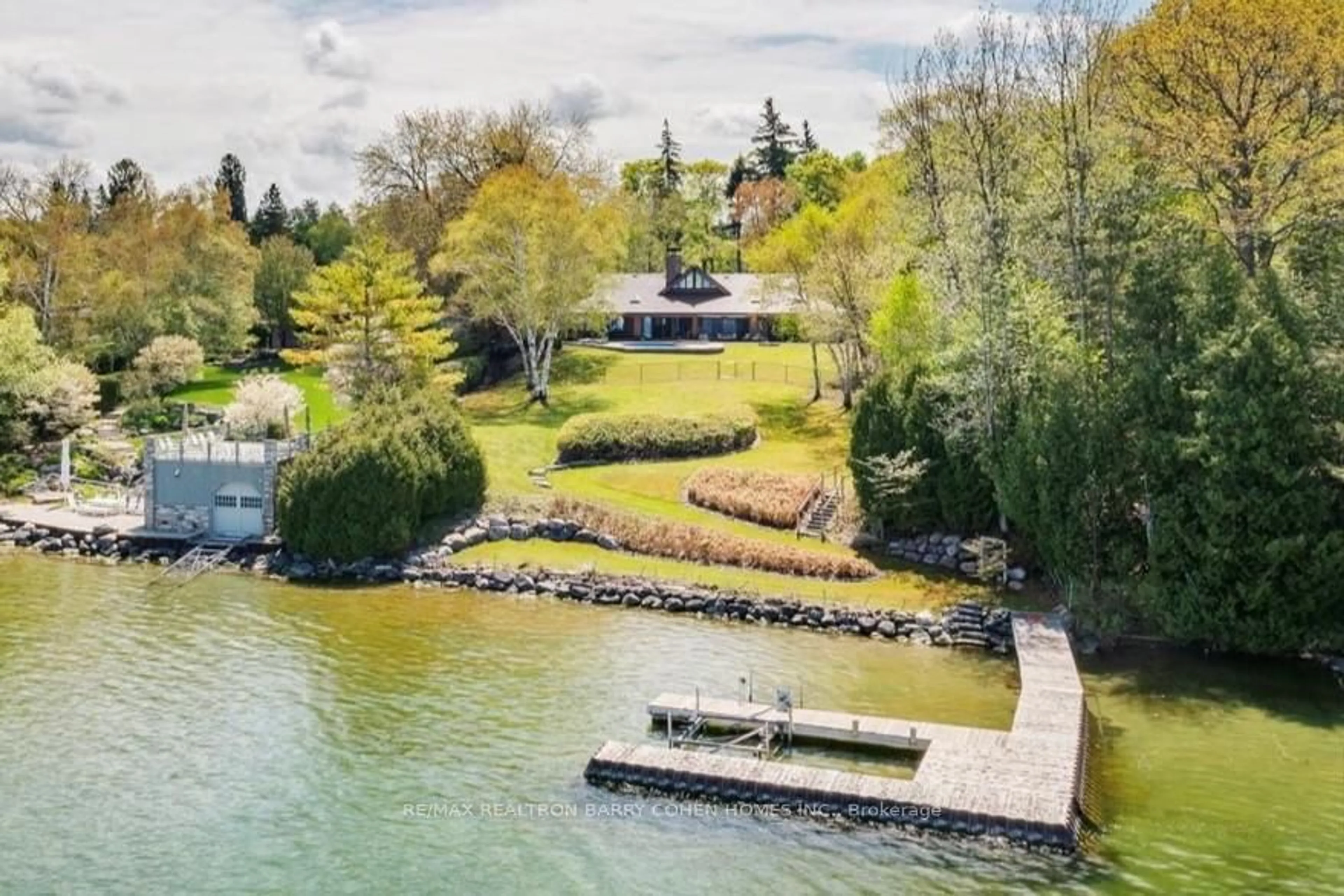 A pic from outside/outdoor area/front of a property/back of a property/a pic from drone, water/lake/river/ocean view for 700 Lake Dr, Georgina Ontario L4P 3C8