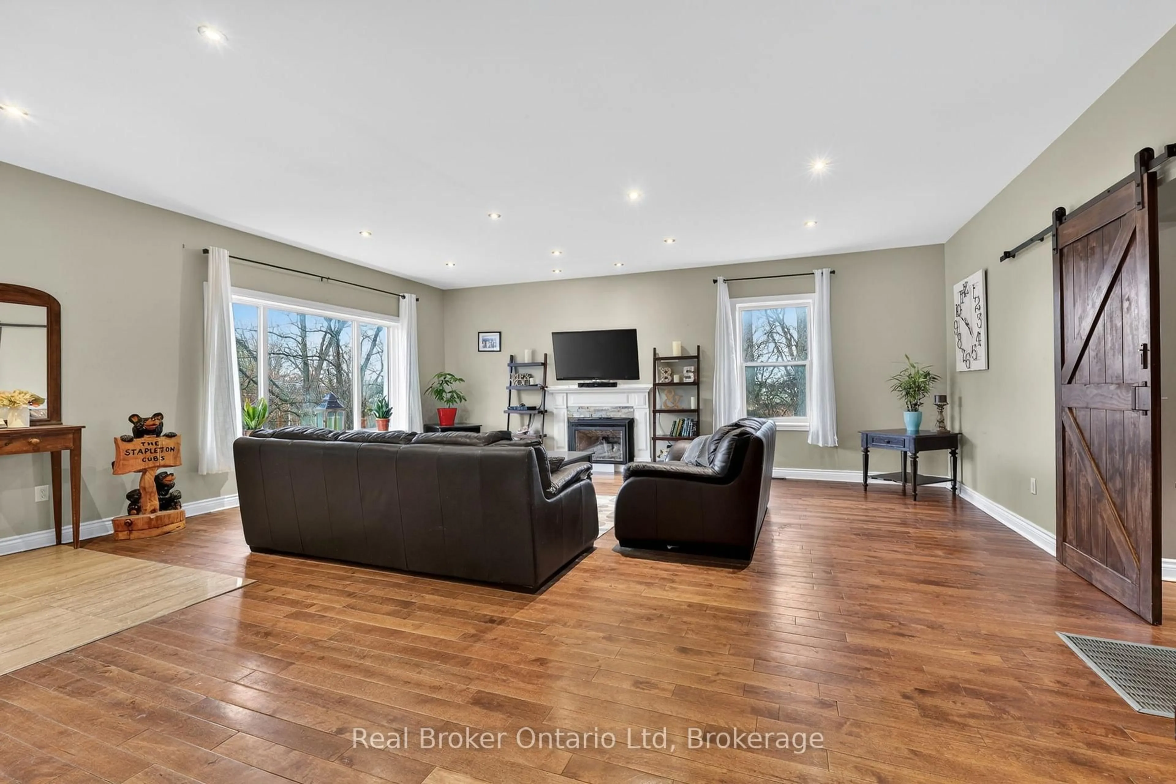 Living room with furniture, wood/laminate floor for 1720 Durham Rd, Brock Ontario L0E 1E0