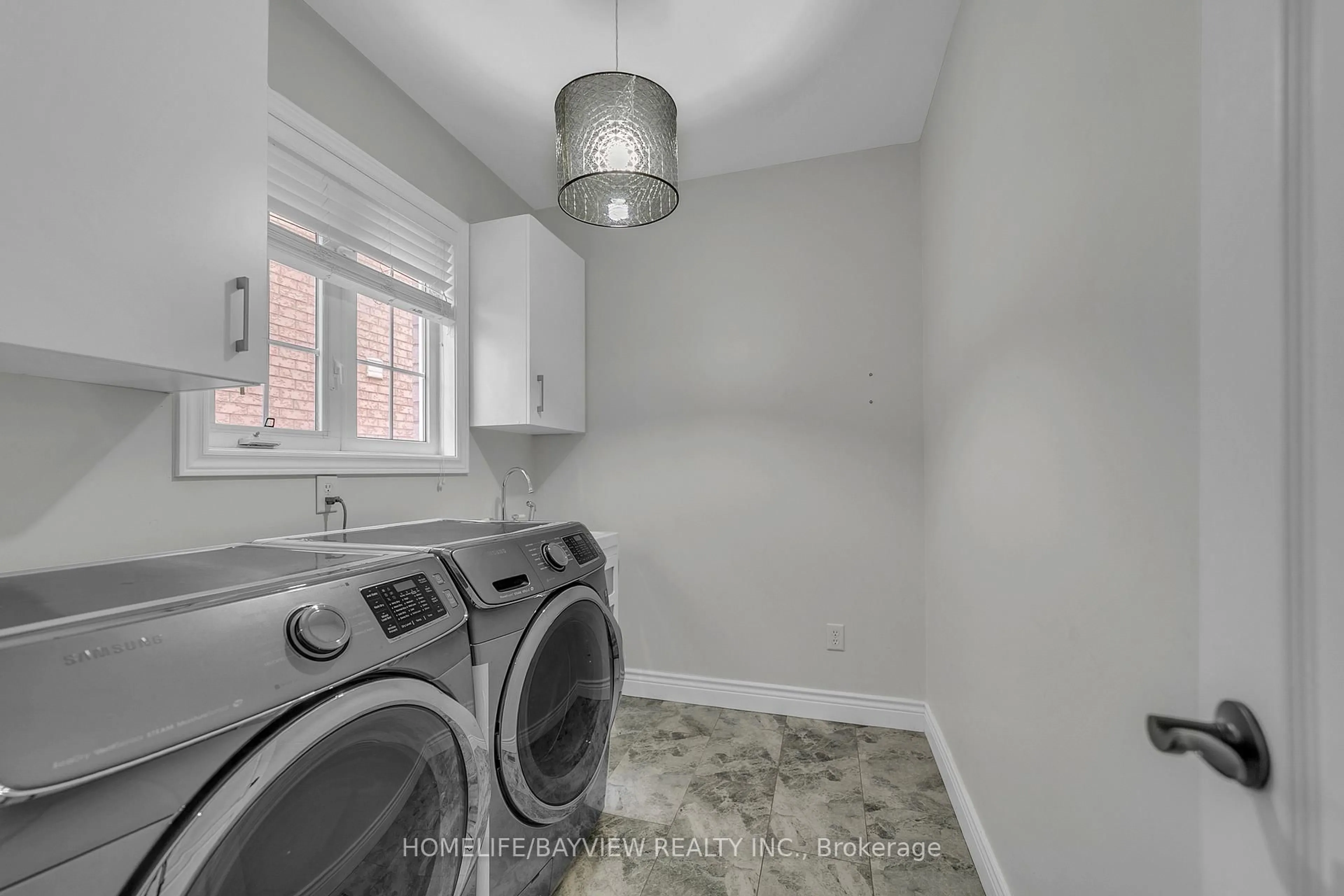 Laundry room for 99 Red Cardinal Tr, Richmond Hill Ontario L4E 4B8