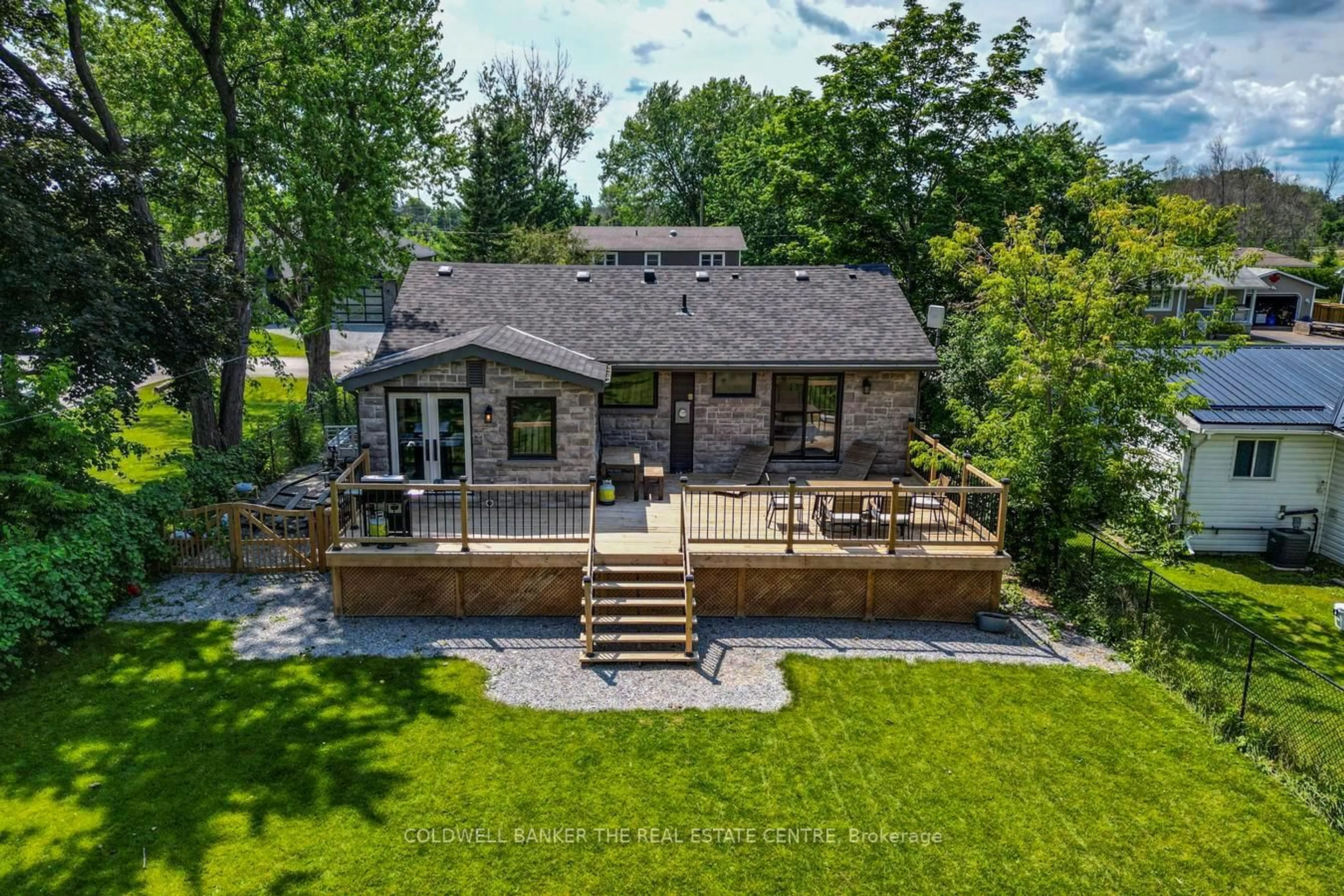 A pic from outside/outdoor area/front of a property/back of a property/a pic from drone, water/lake/river/ocean view for 15 Blue Jay Blvd, Georgina Ontario L0E 1N0