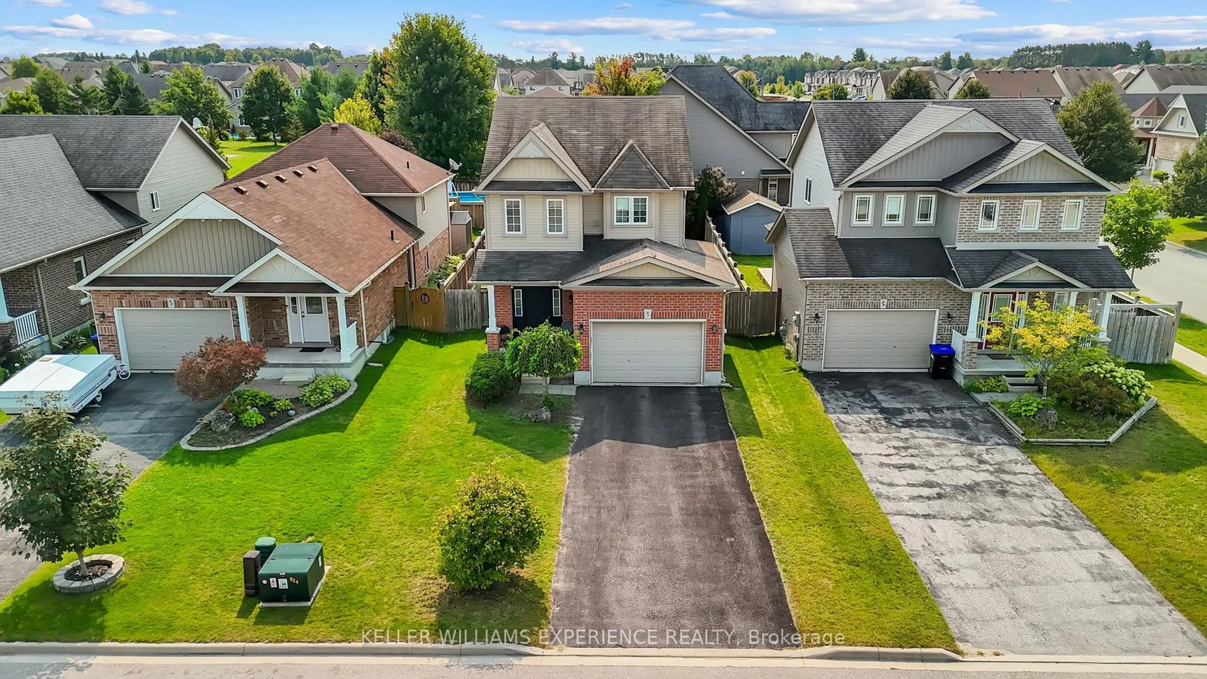 A pic from outside/outdoor area/front of a property/back of a property/a pic from drone, street for 91 Quigley St, Essa Ontario L3W 0P5
