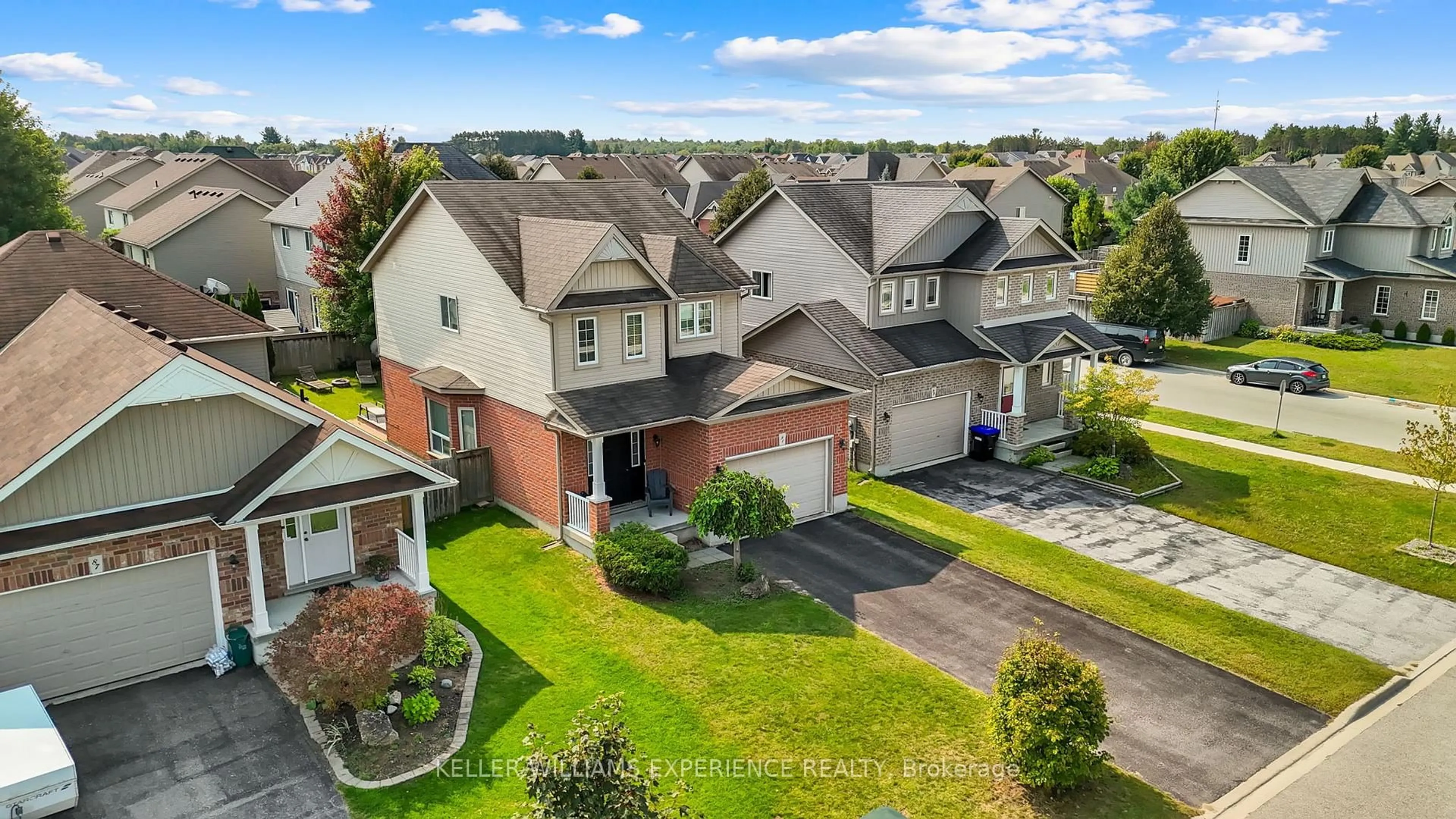 A pic from outside/outdoor area/front of a property/back of a property/a pic from drone, street for 91 Quigley St, Essa Ontario L3W 0P5