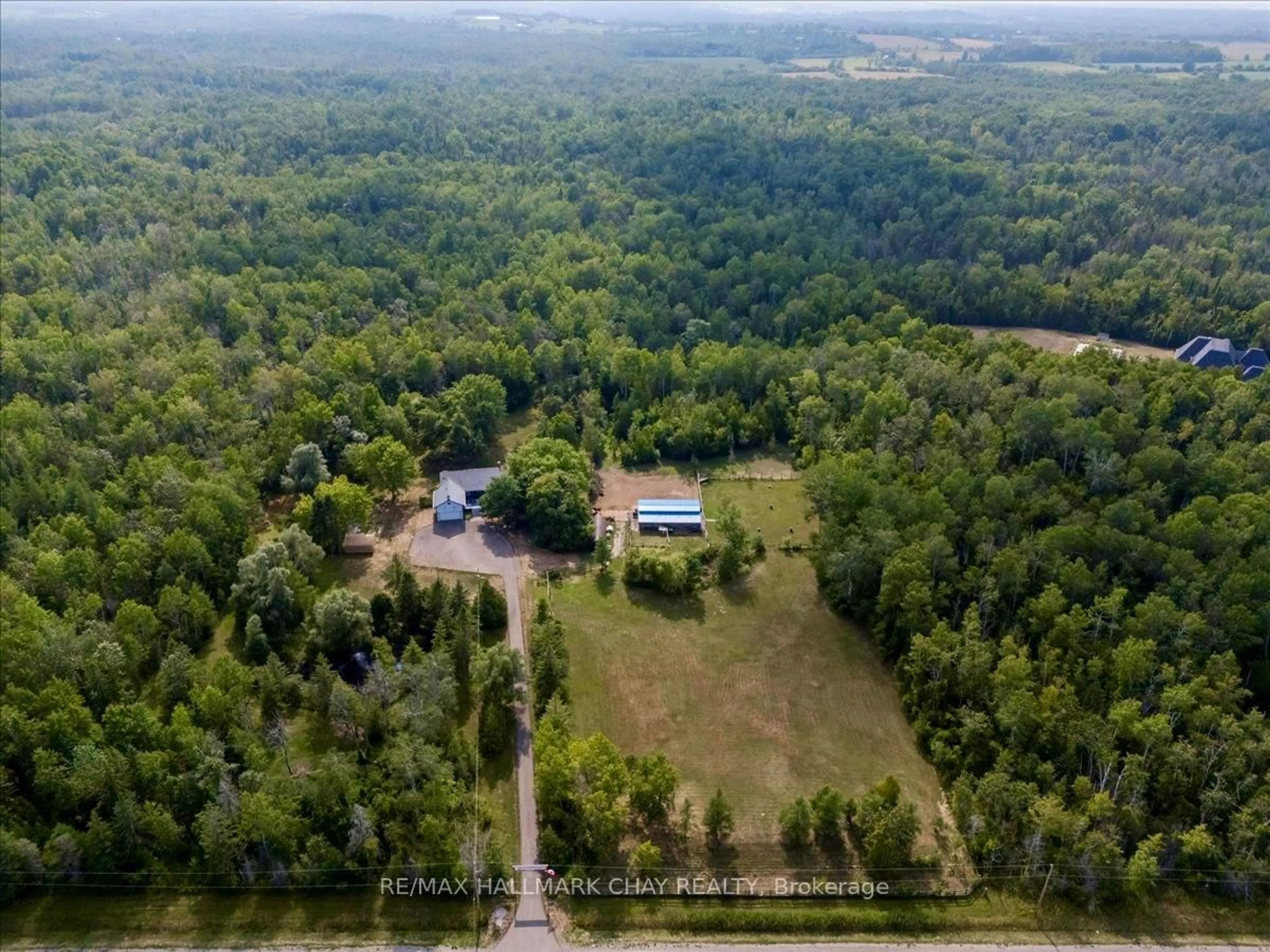 A pic from outside/outdoor area/front of a property/back of a property/a pic from drone, forest/trees view for 25222 Park Rd, Georgina Ontario L0E 1R0