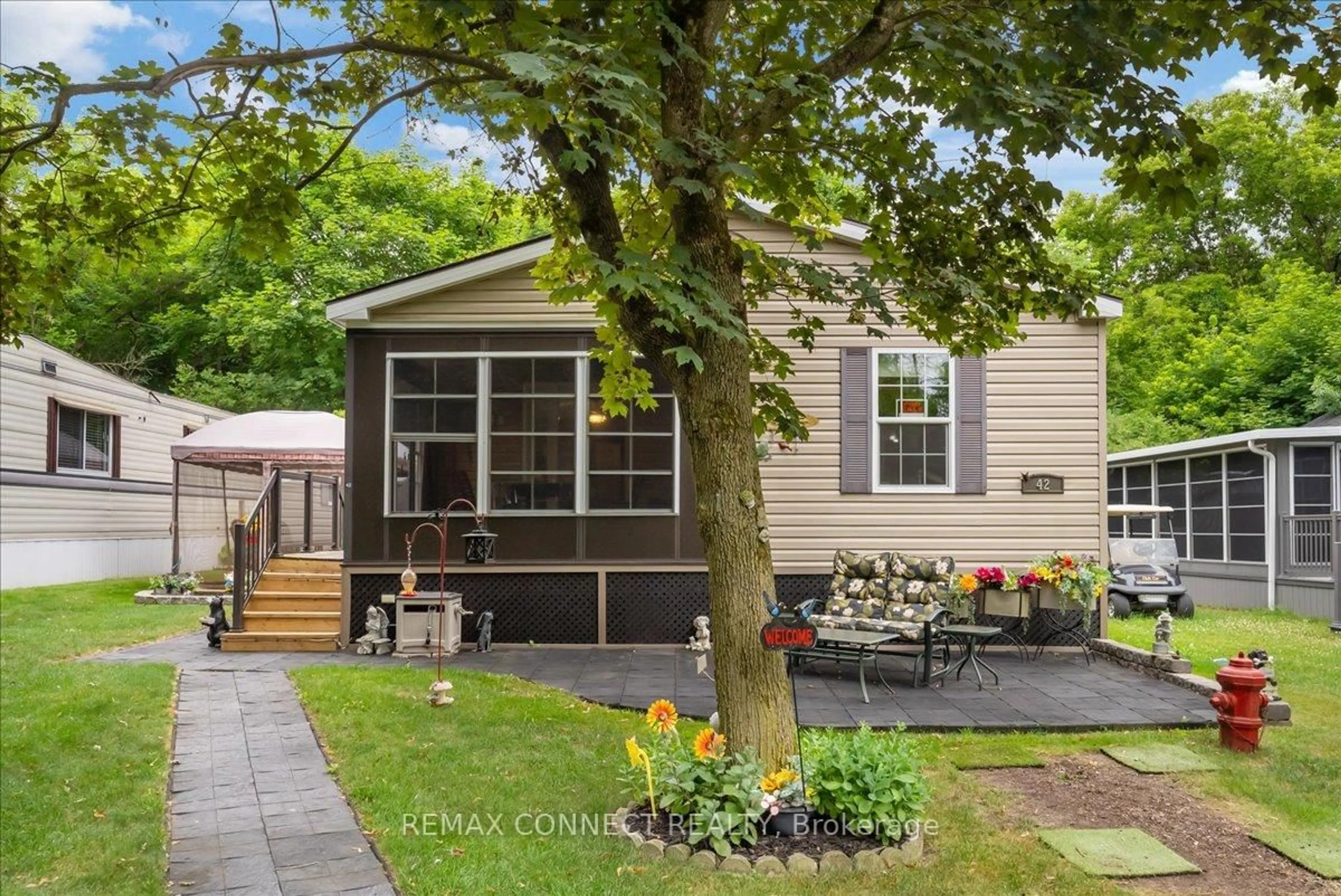 Home with vinyl exterior material, street for 15014 Ninth Line #Site Spruce #42, Whitchurch-Stouffville Ontario L0G 1E0