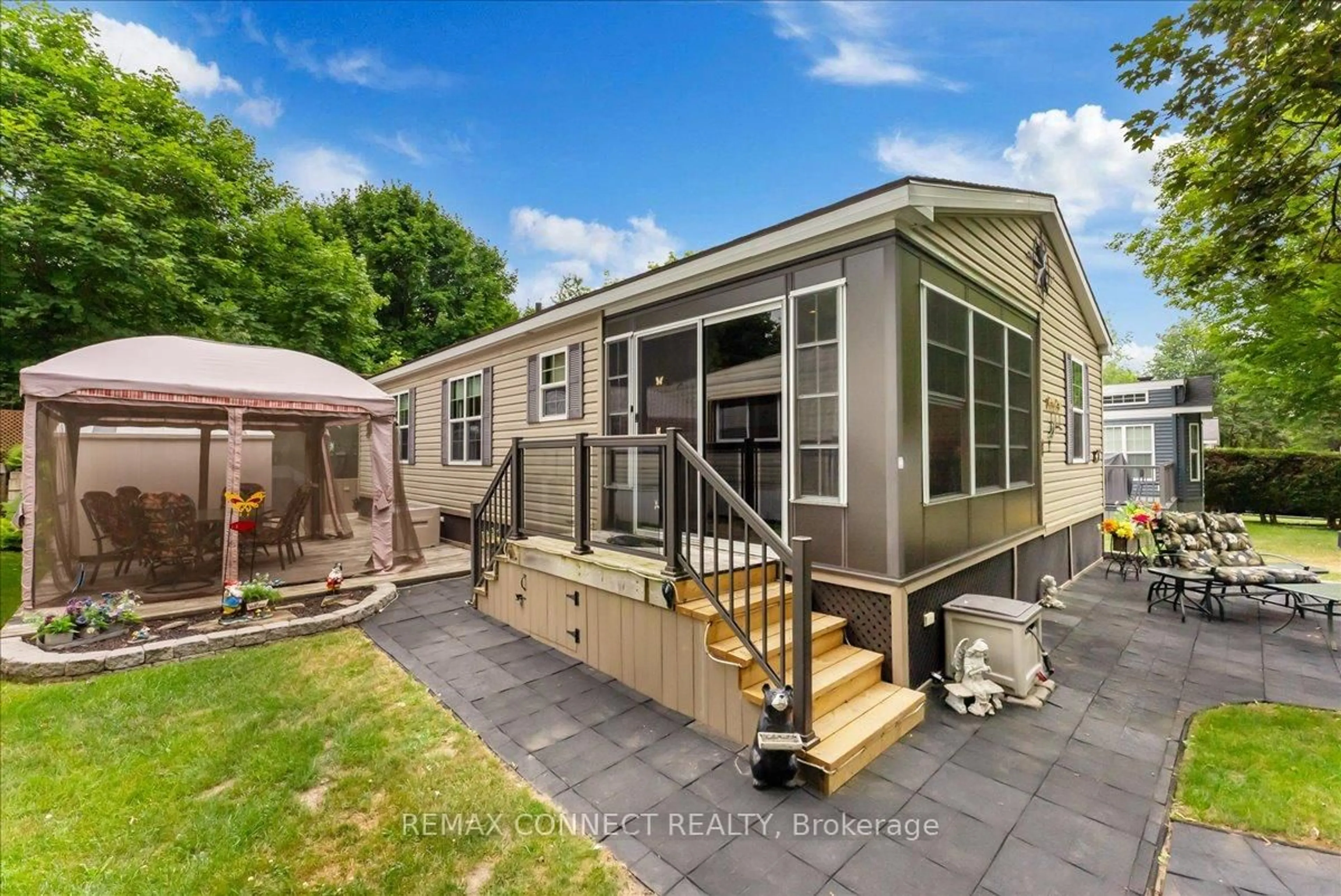Home with vinyl exterior material, street for 15014 Ninth Line #Site Spruce #42, Whitchurch-Stouffville Ontario L0G 1E0