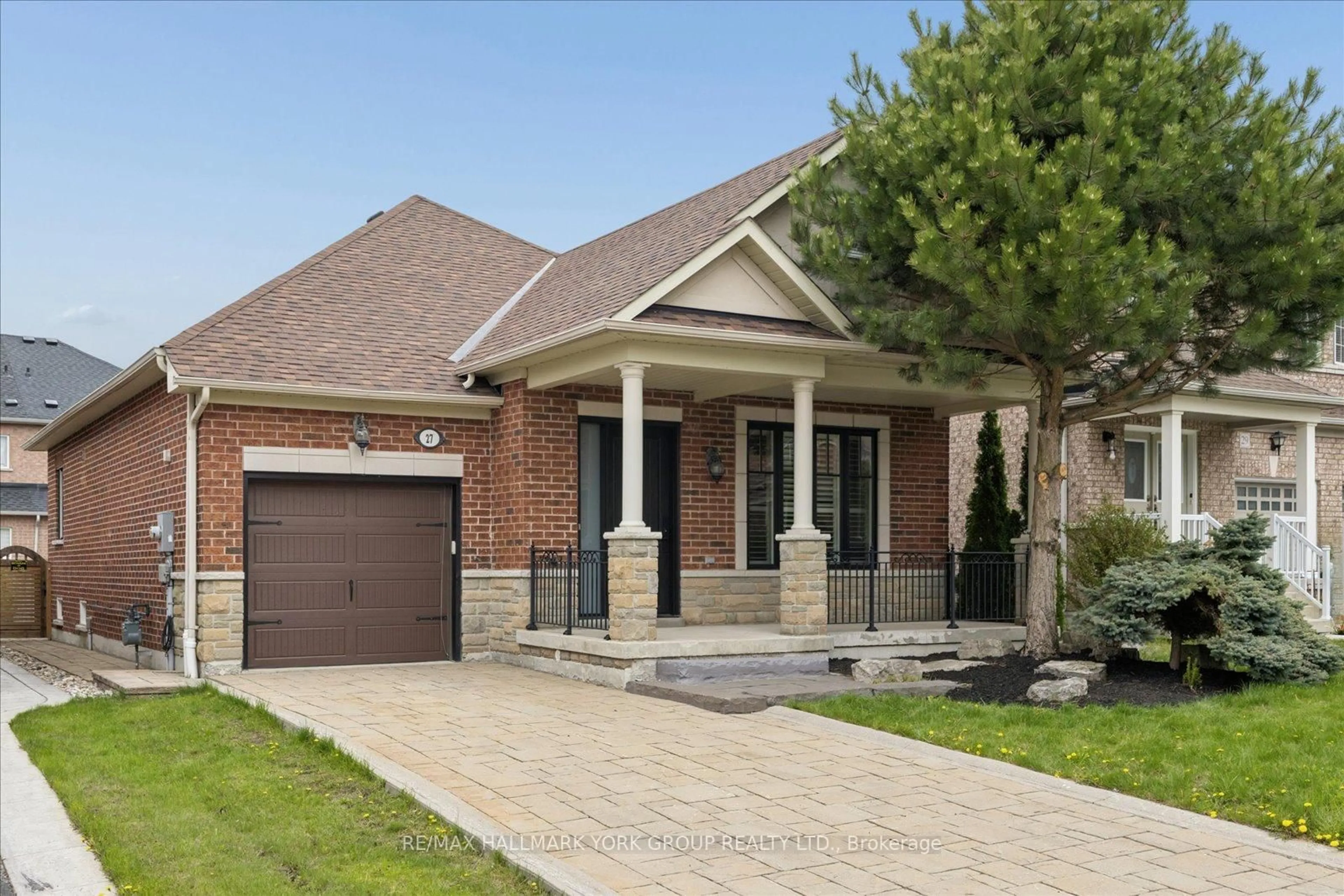 Home with brick exterior material, street for 27 Butterwood Lane, Whitchurch-Stouffville Ontario L4A 0M7