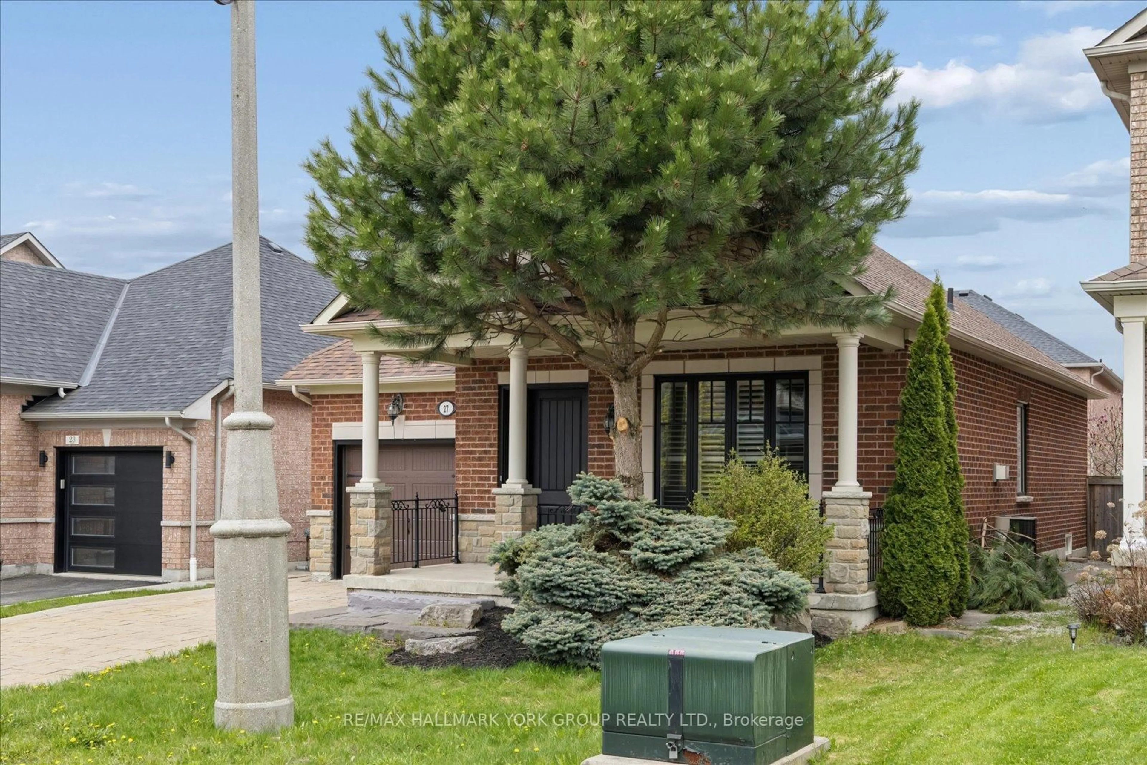 Home with brick exterior material, street for 27 Butterwood Lane, Whitchurch-Stouffville Ontario L4A 0M7