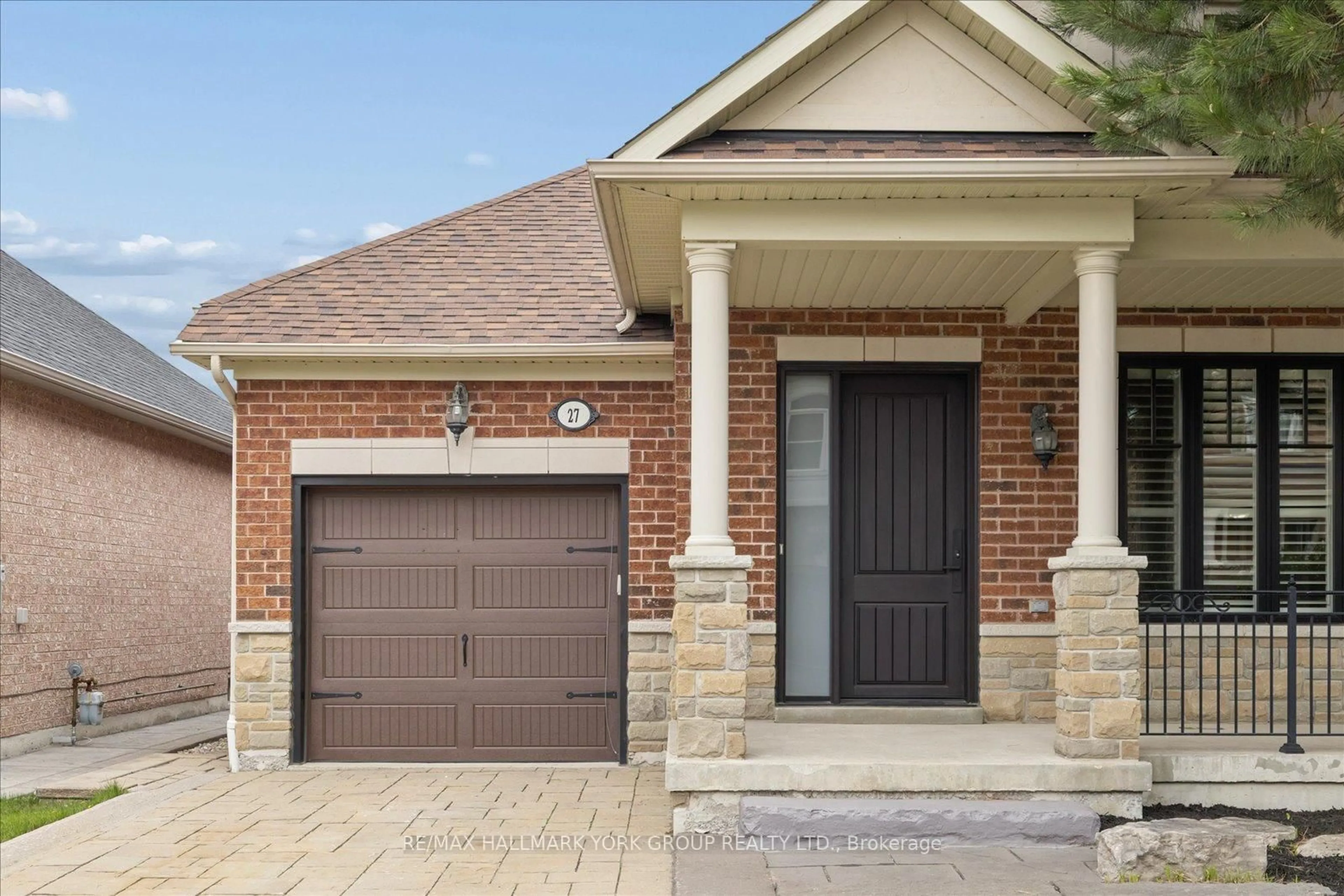 Home with brick exterior material, street for 27 Butterwood Lane, Whitchurch-Stouffville Ontario L4A 0M7