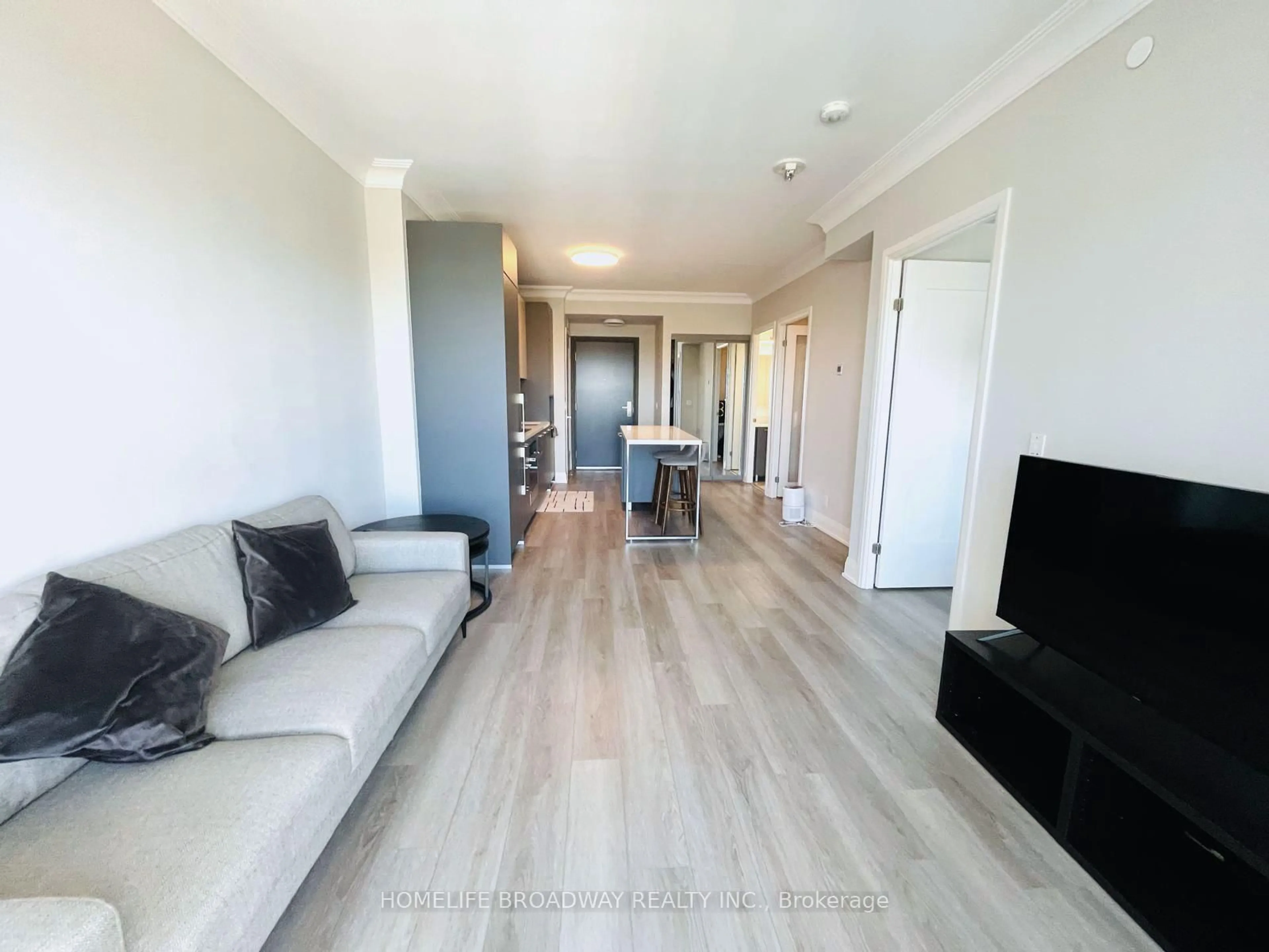 Living room with furniture, wood/laminate floor for 8 Water Walk Dr #3609, Markham Ontario L3R 6L4