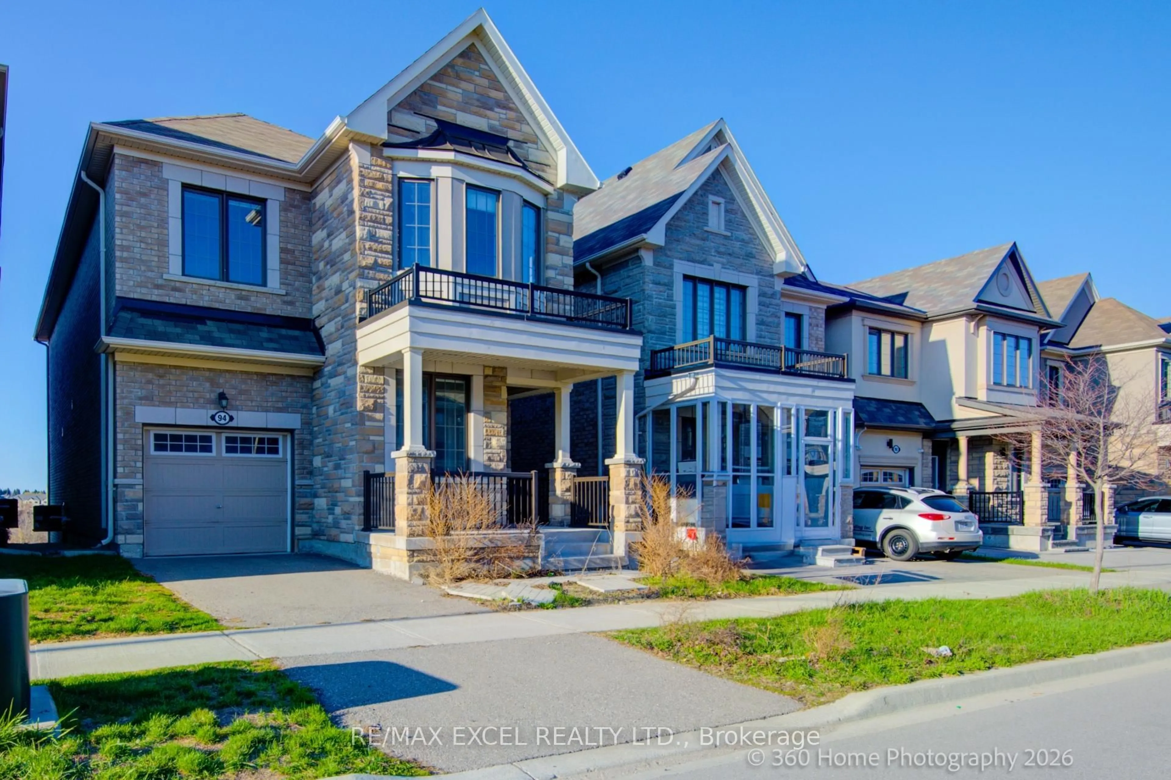 Home with brick exterior material, street for 94 Hartney Dr, Richmond Hill Ontario L4S 0K6