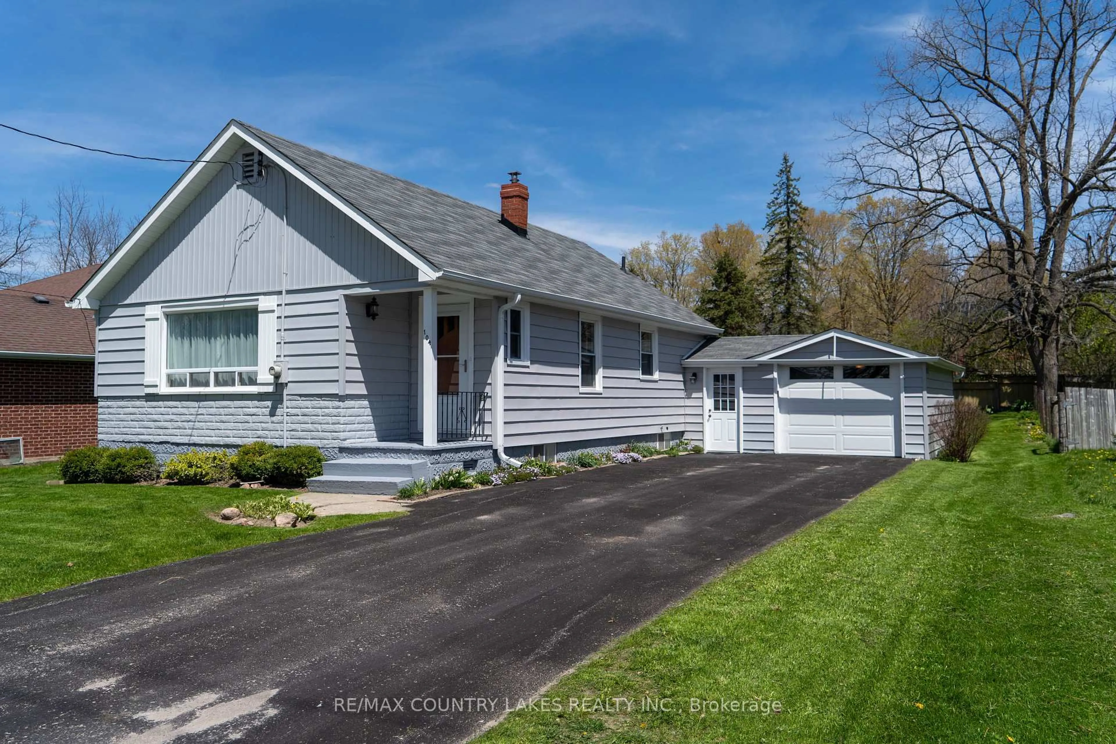 Home with vinyl exterior material, street for 104 Laidlaw St, Brock Ontario L0E 1E0