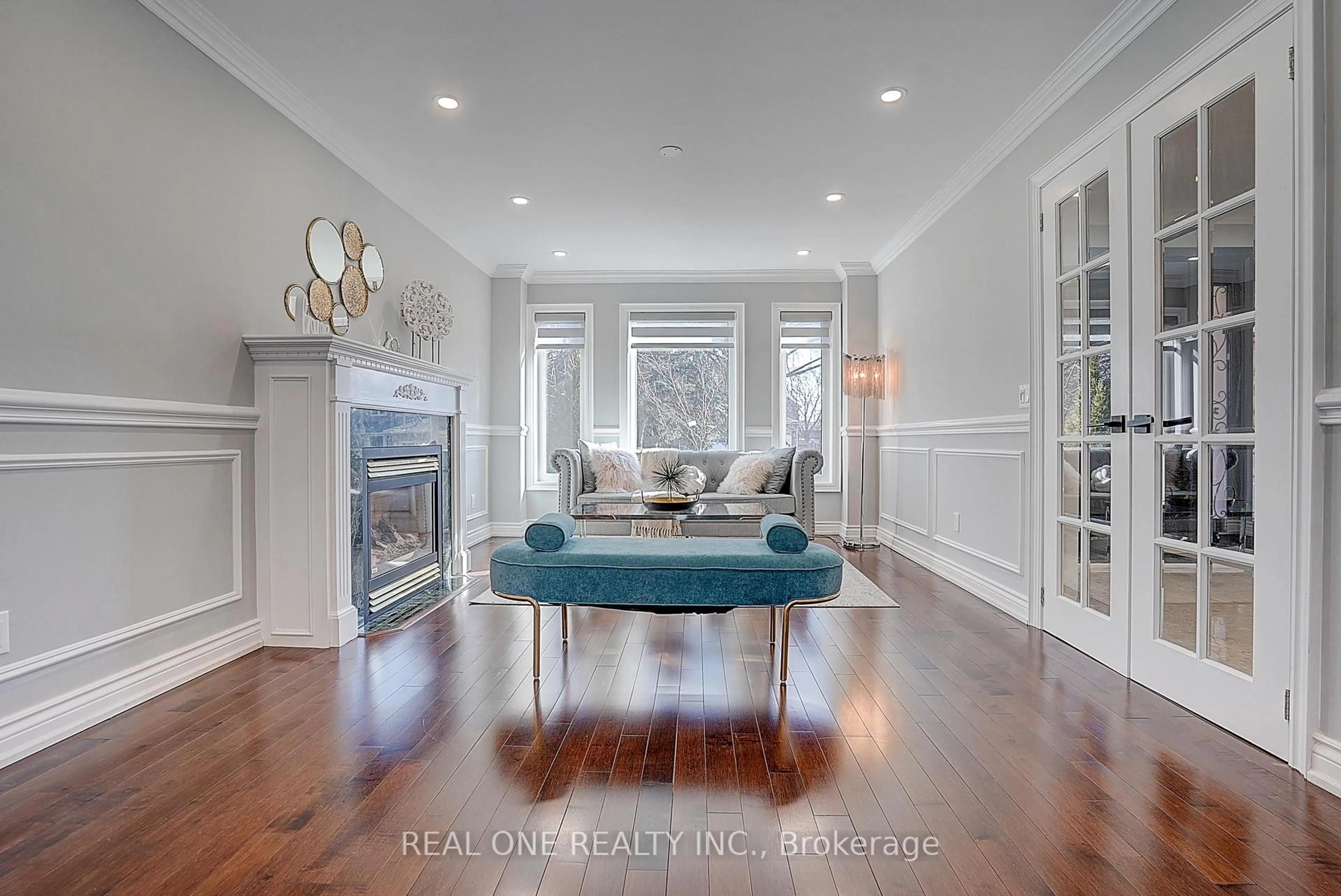 Living room with furniture, wood/laminate floor for 4 Casson Pl, Markham Ontario L3R 0G2
