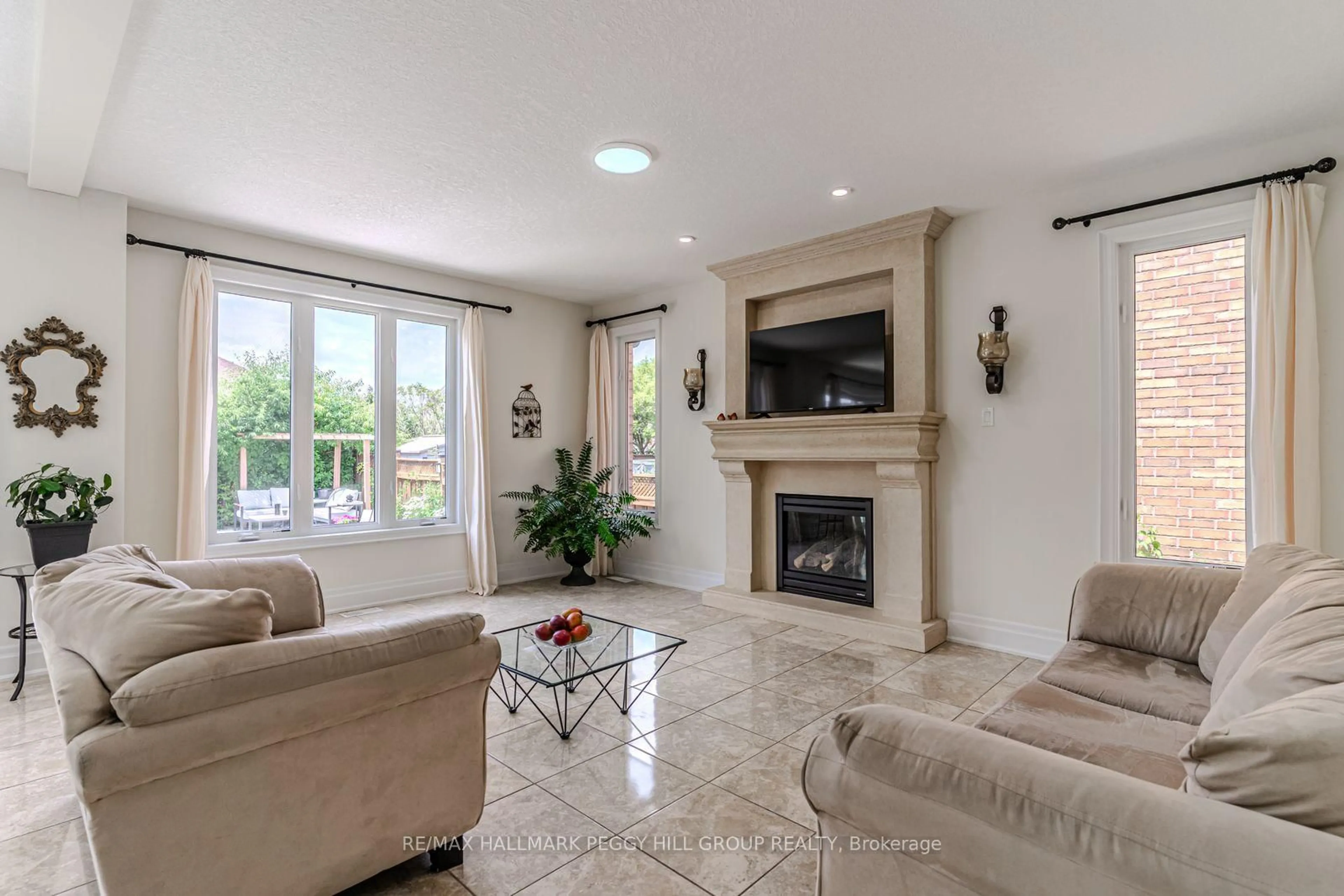 Living room with furniture, ceramic/tile floor for 1746 Angus St, Innisfil Ontario L9S 4X2