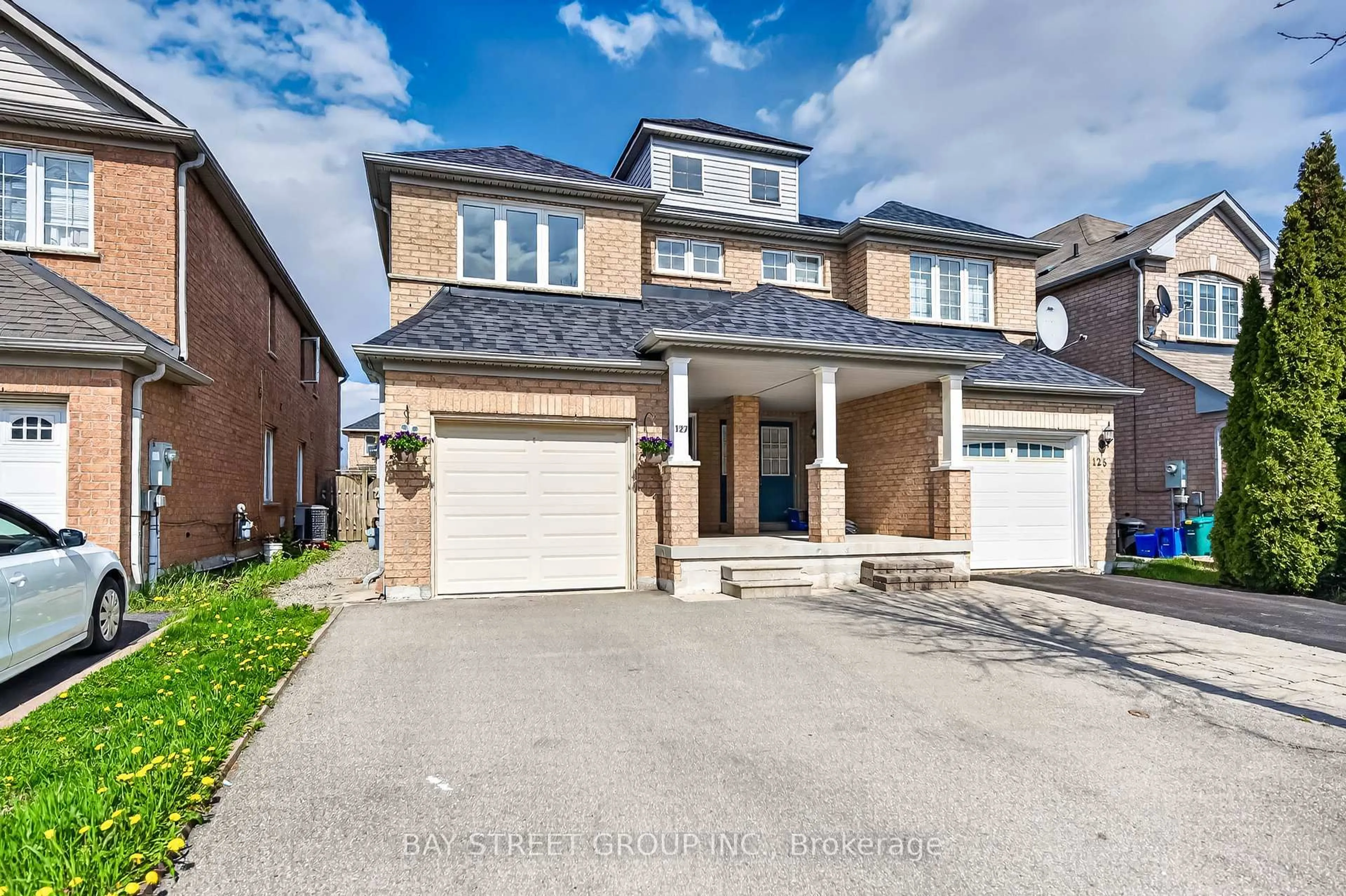 Home with brick exterior material, street for 127 Guinevere Rd, Markham Ontario L3S 4V1