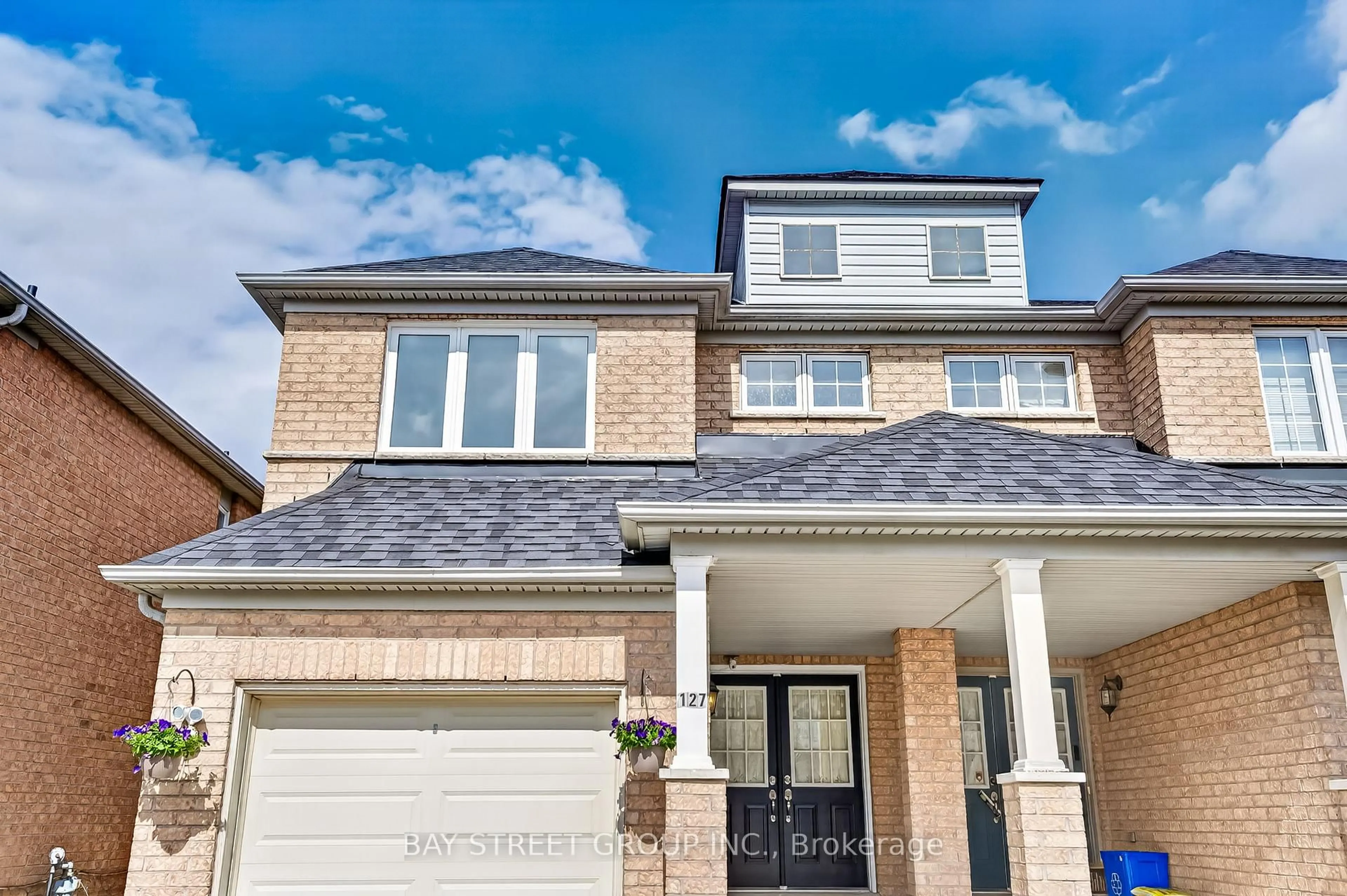 Home with brick exterior material, street for 127 Guinevere Rd, Markham Ontario L3S 4V1