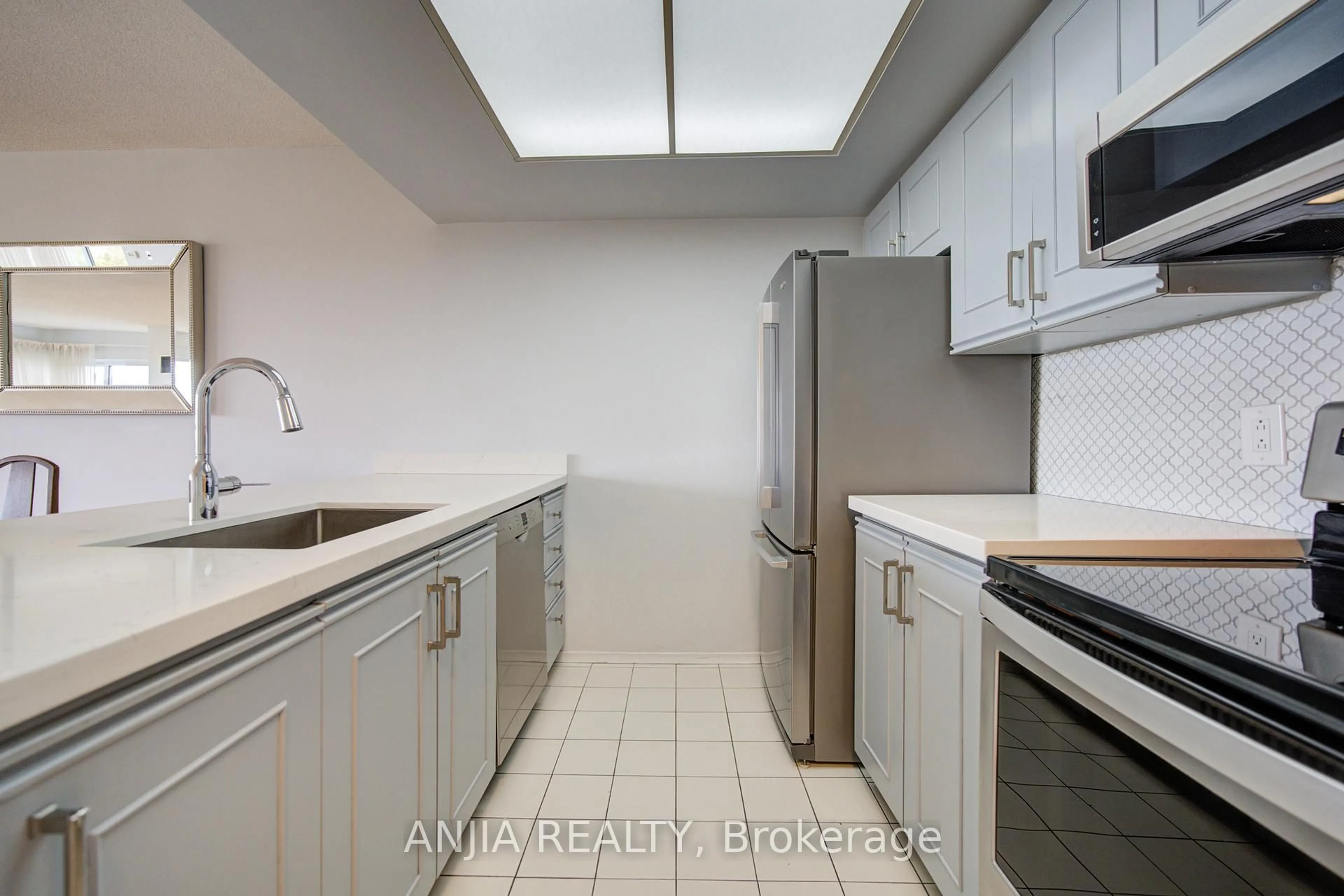 Standard kitchen, ceramic/tile floor for 2 Raymerville Dr #908, Markham Ontario L3P 7N7