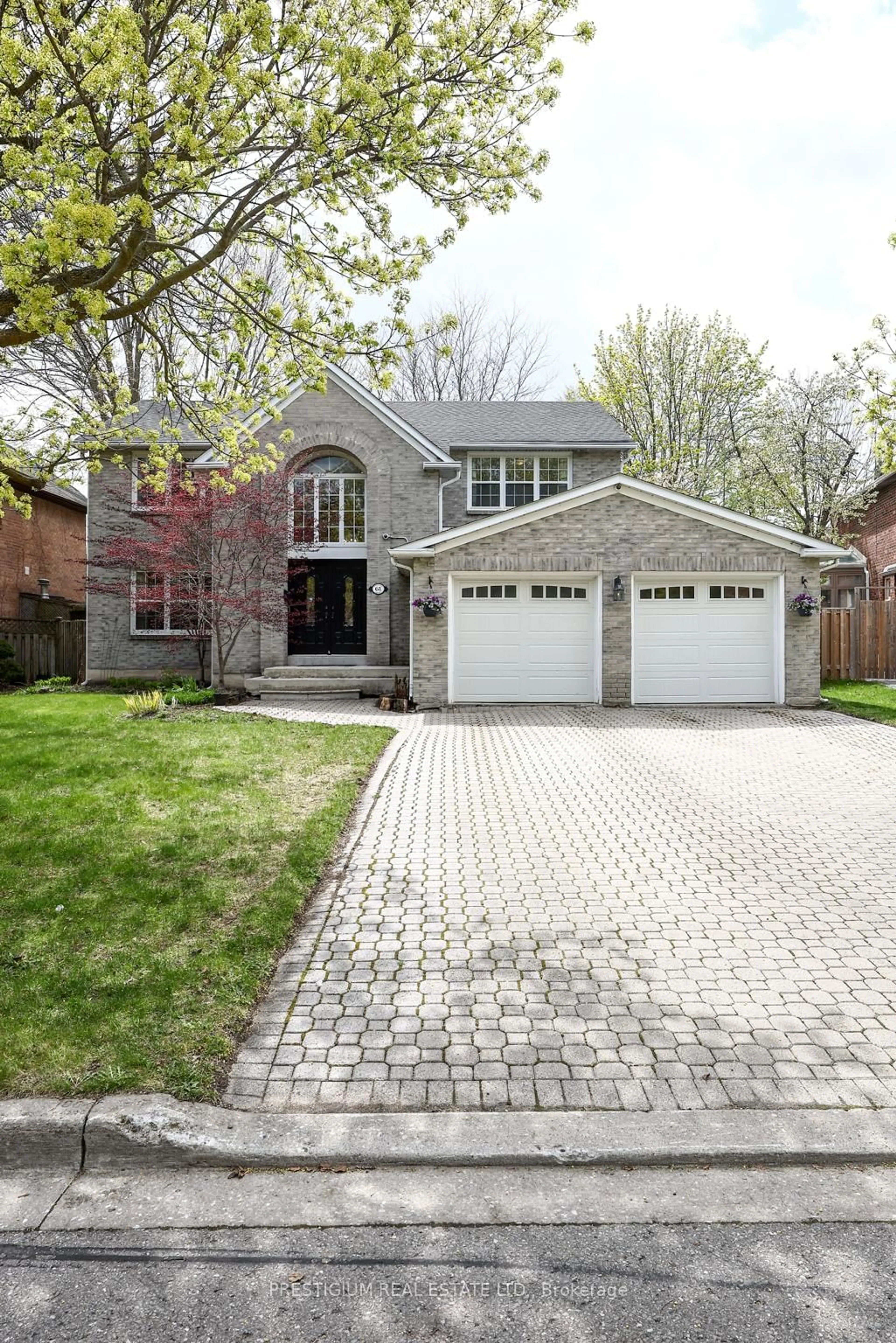 Home with brick exterior material, street for 61 Addington Sq, Markham Ontario L3R 7N2