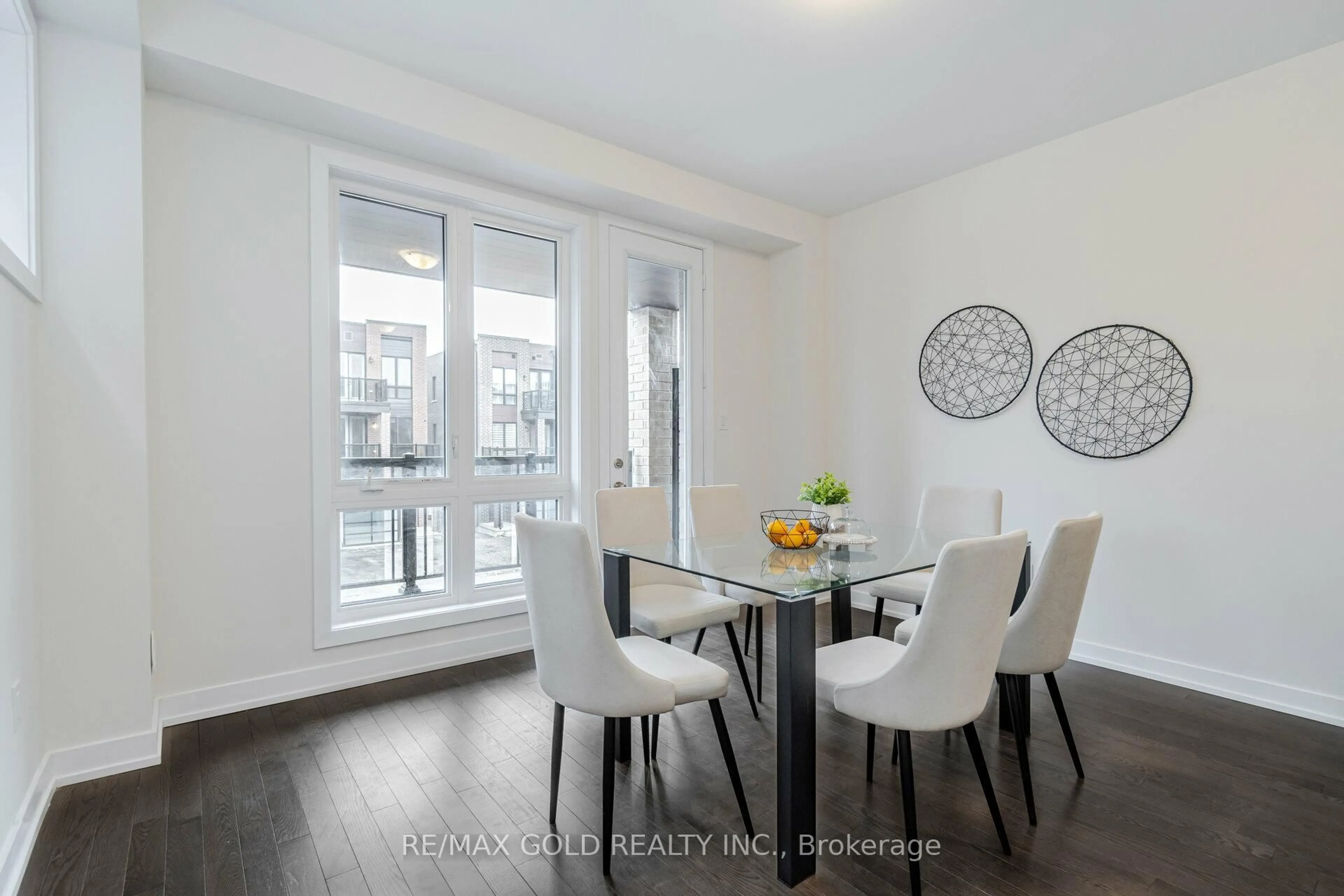 Dining room, wood/laminate floor for 59 Mikayla Lane, Markham Ontario K6B 1R1