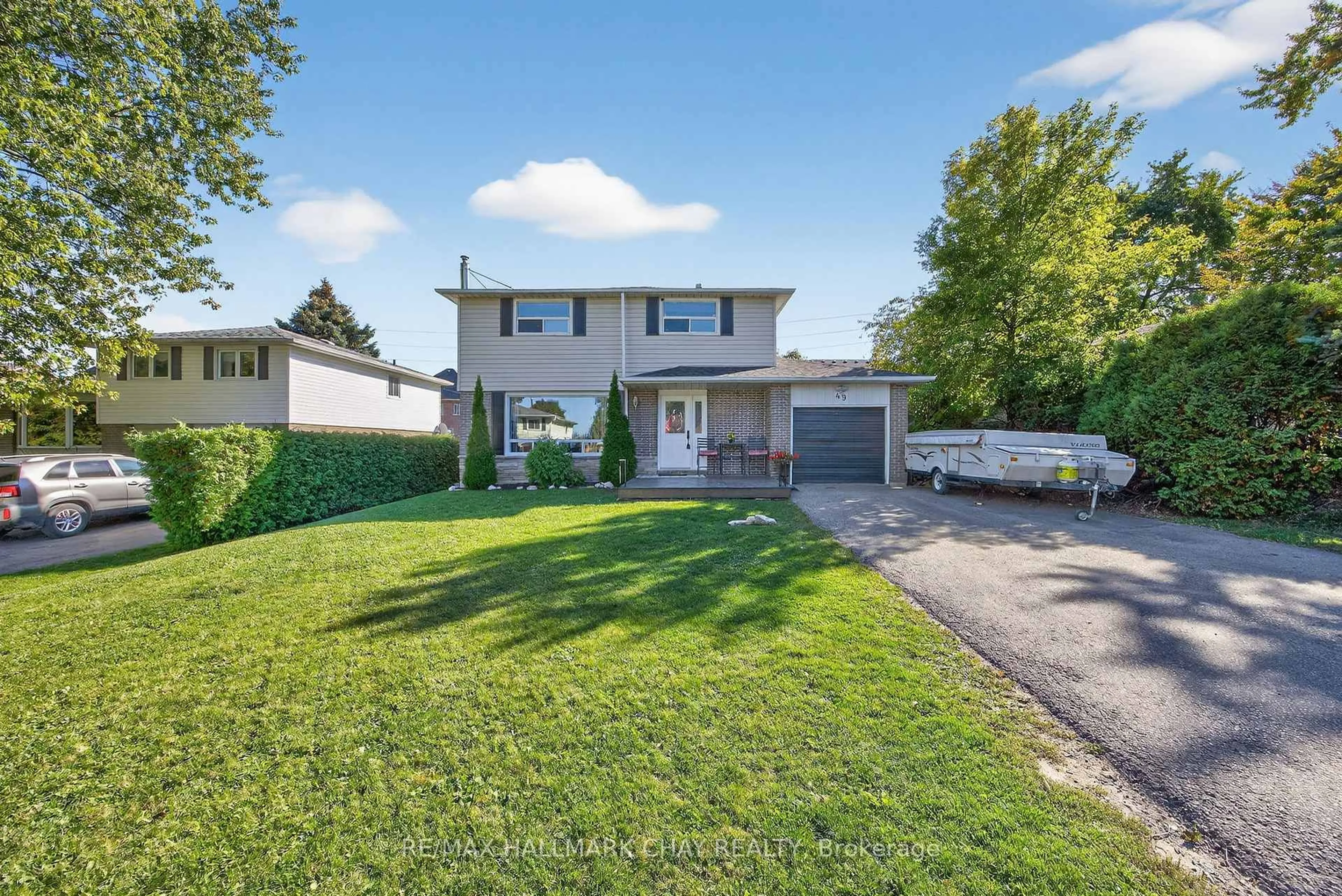 A pic from outside/outdoor area/front of a property/back of a property/a pic from drone, street for 49 Brown St, New Tecumseth Ontario L0G 1W0
