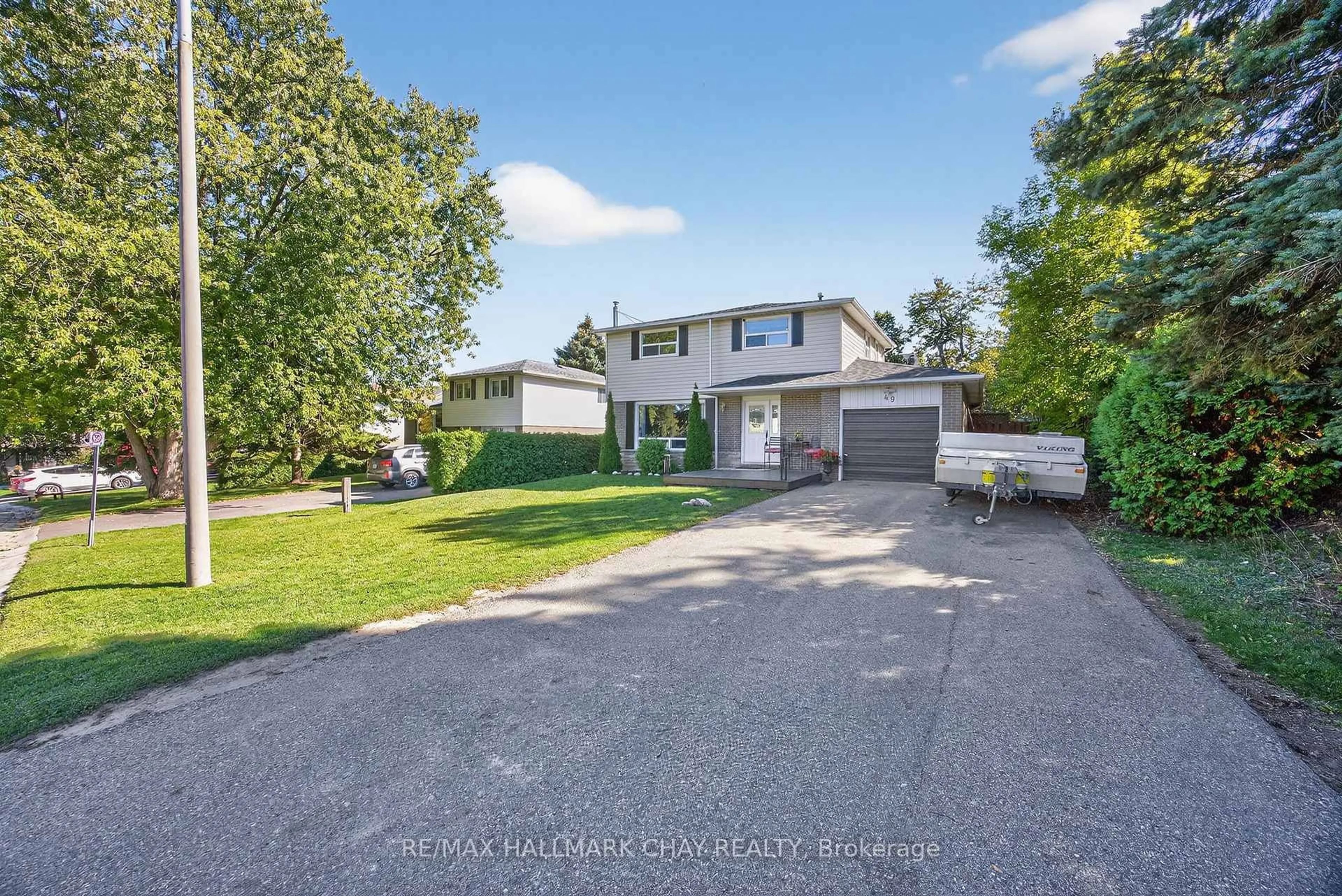 A pic from outside/outdoor area/front of a property/back of a property/a pic from drone, street for 49 Brown St, New Tecumseth Ontario L0G 1W0