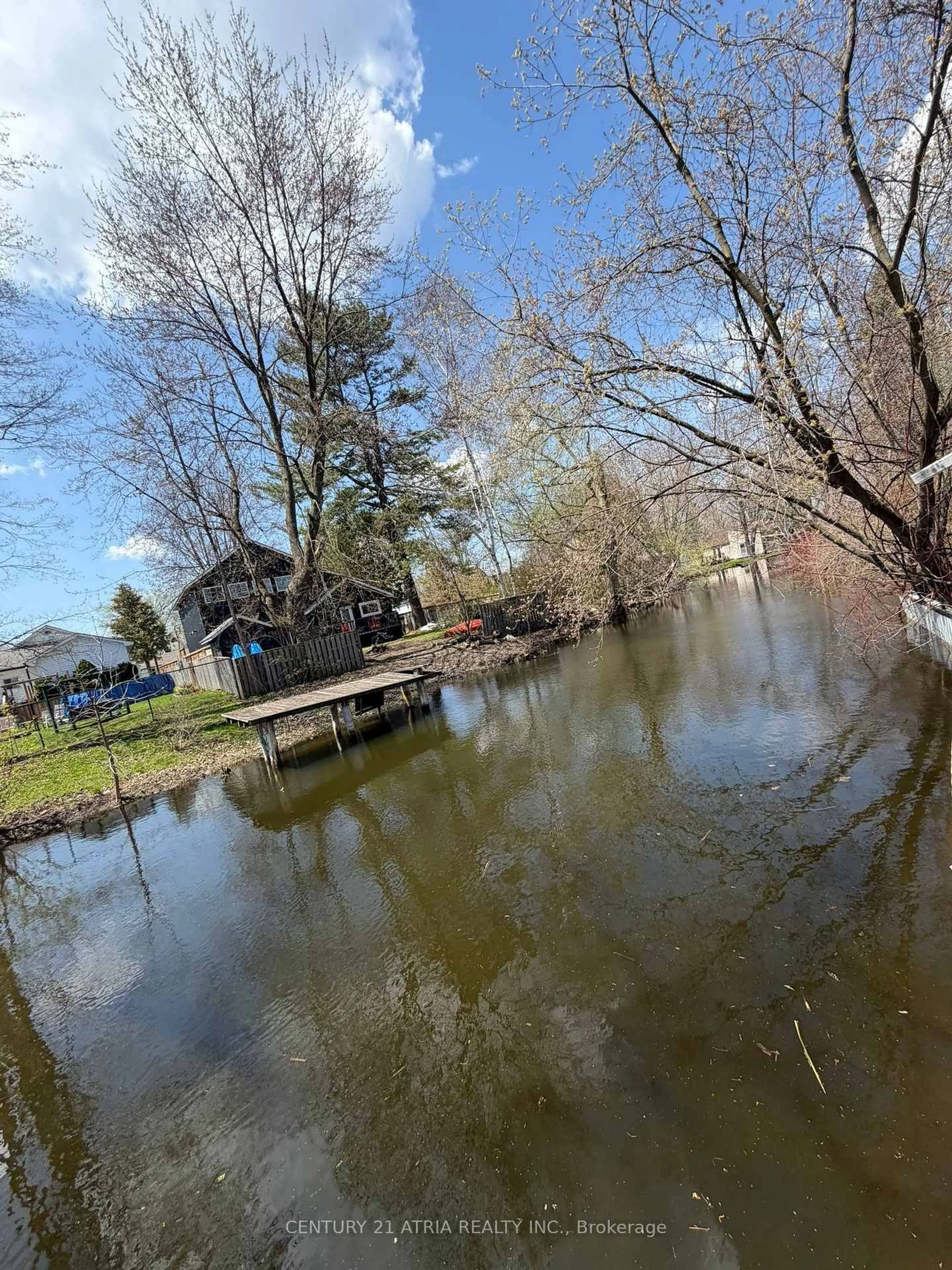 A pic from outside/outdoor area/front of a property/back of a property/a pic from drone, water/lake/river/ocean view for 27 Waterbend Dr, Georgina Ontario L4P 2S3