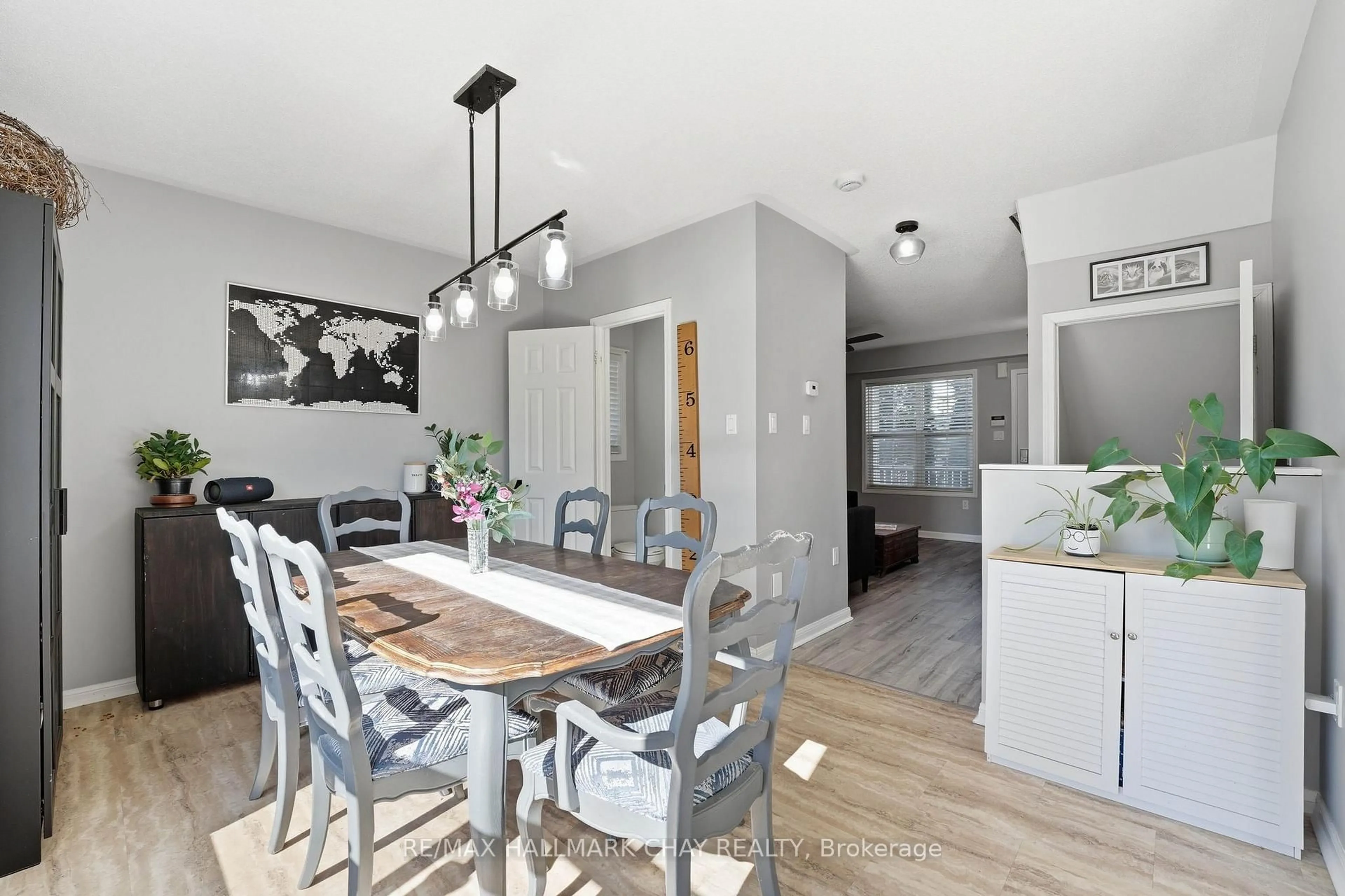 Open concept kitchen, wood/laminate floor for 167 Maplewood Dr, Essa Ontario L0M 1B4