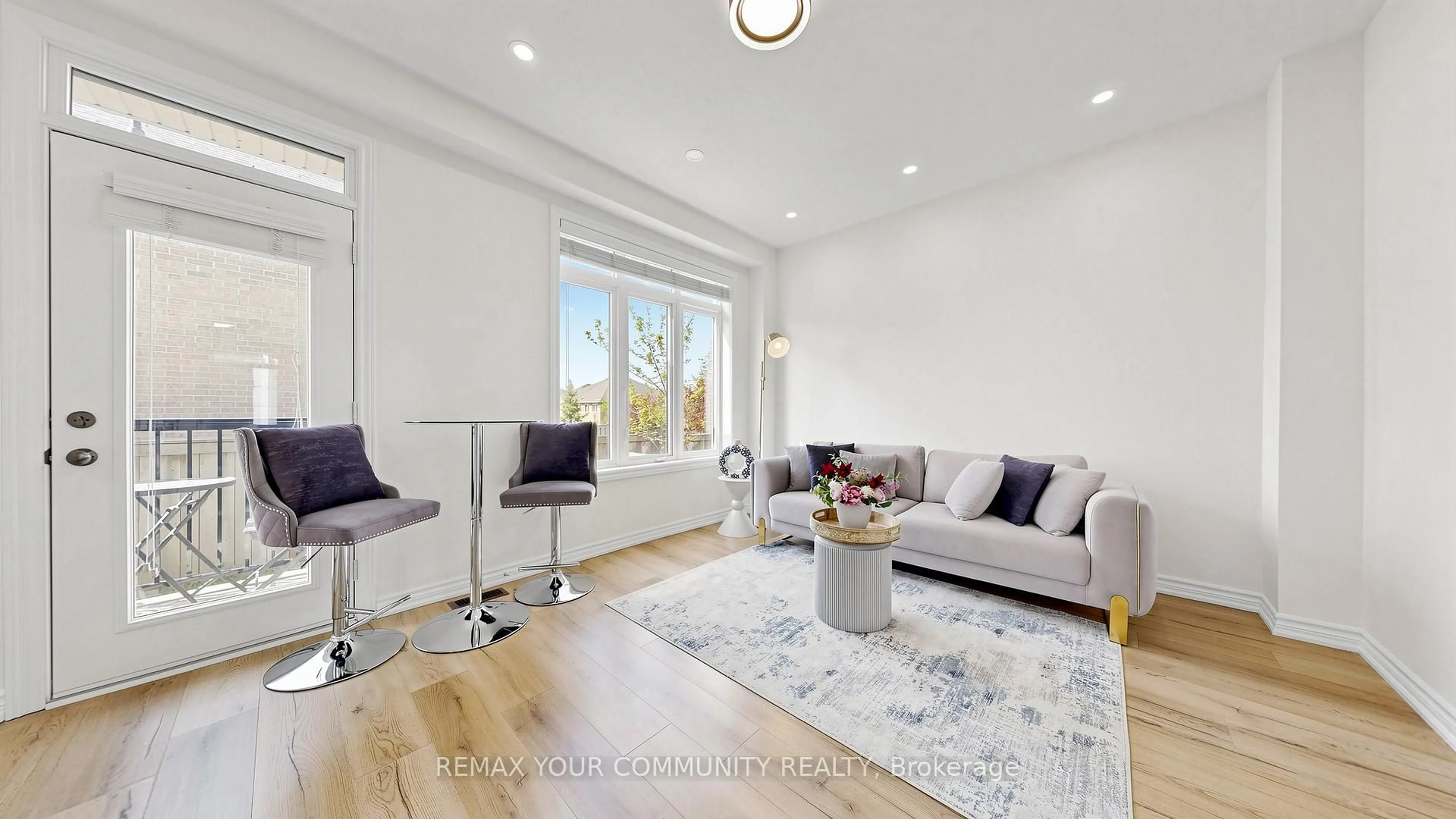 Living room with furniture, wood/laminate floor for 10 William Adams Lane, Richmond Hill Ontario L4S 0L9