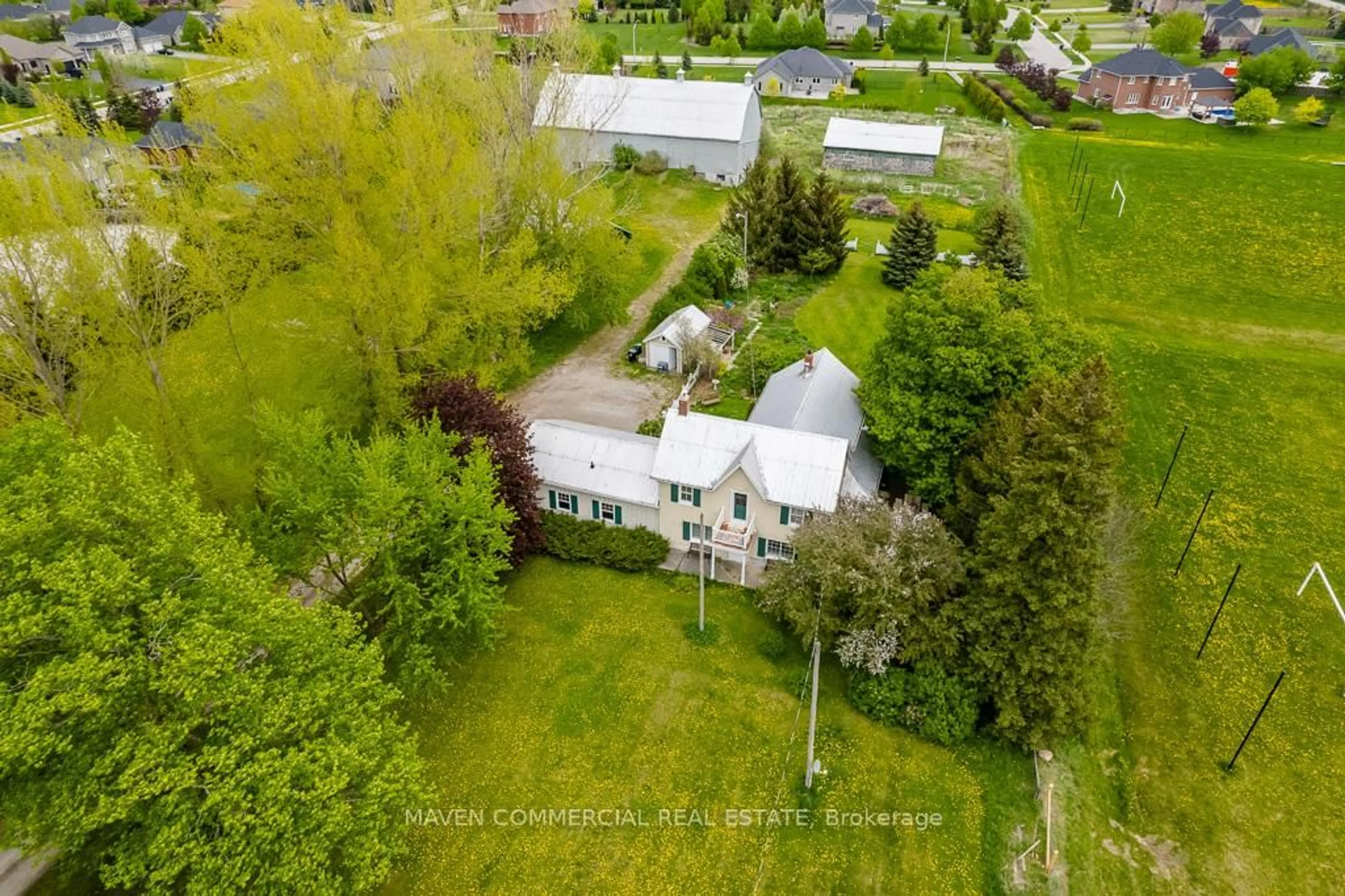 A pic from outside/outdoor area/front of a property/back of a property/a pic from drone, street for 6649 County Road 27 Rd, Essa Ontario L0L 2N2
