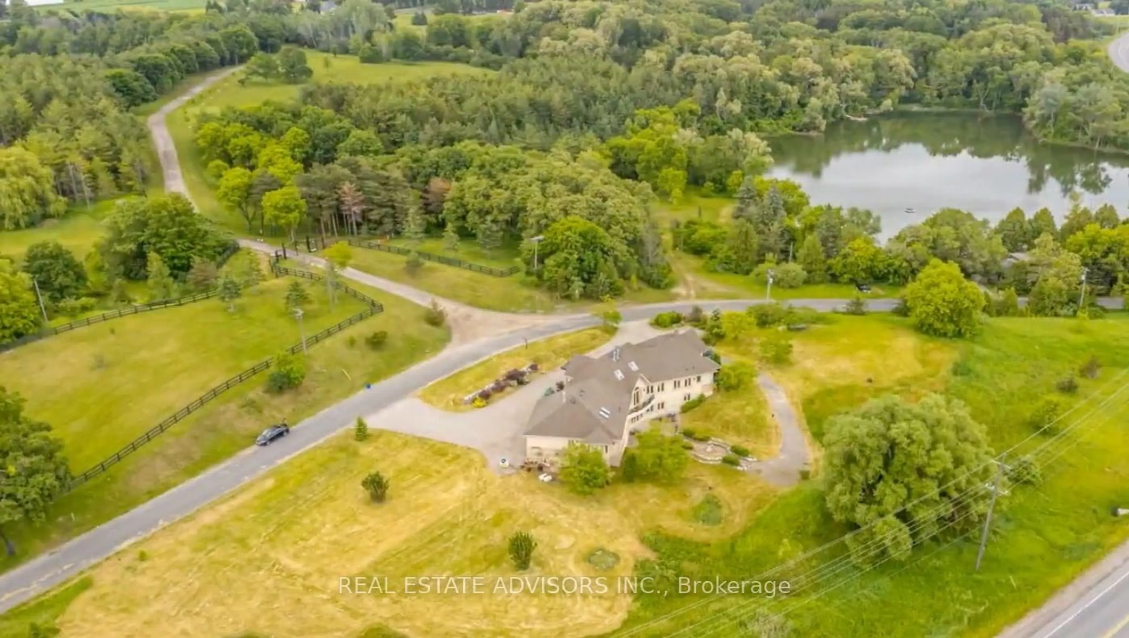 A pic from outside/outdoor area/front of a property/back of a property/a pic from drone, water/lake/river/ocean view for 20 Bells Lake Rd, King Ontario L0G 1T0