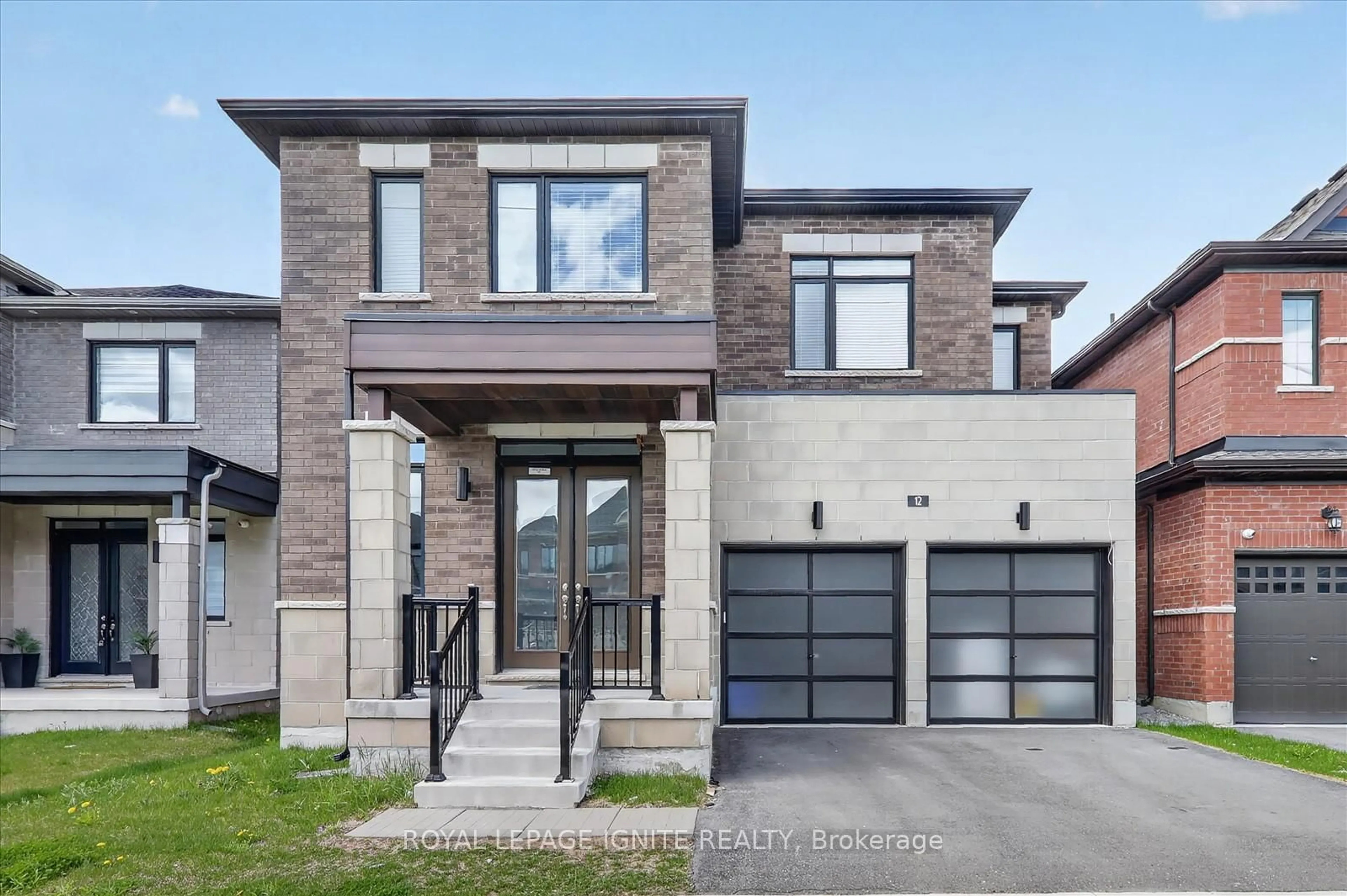 Home with brick exterior material, street for 12 Nigh Dr, Markham Ontario L3S 0G4