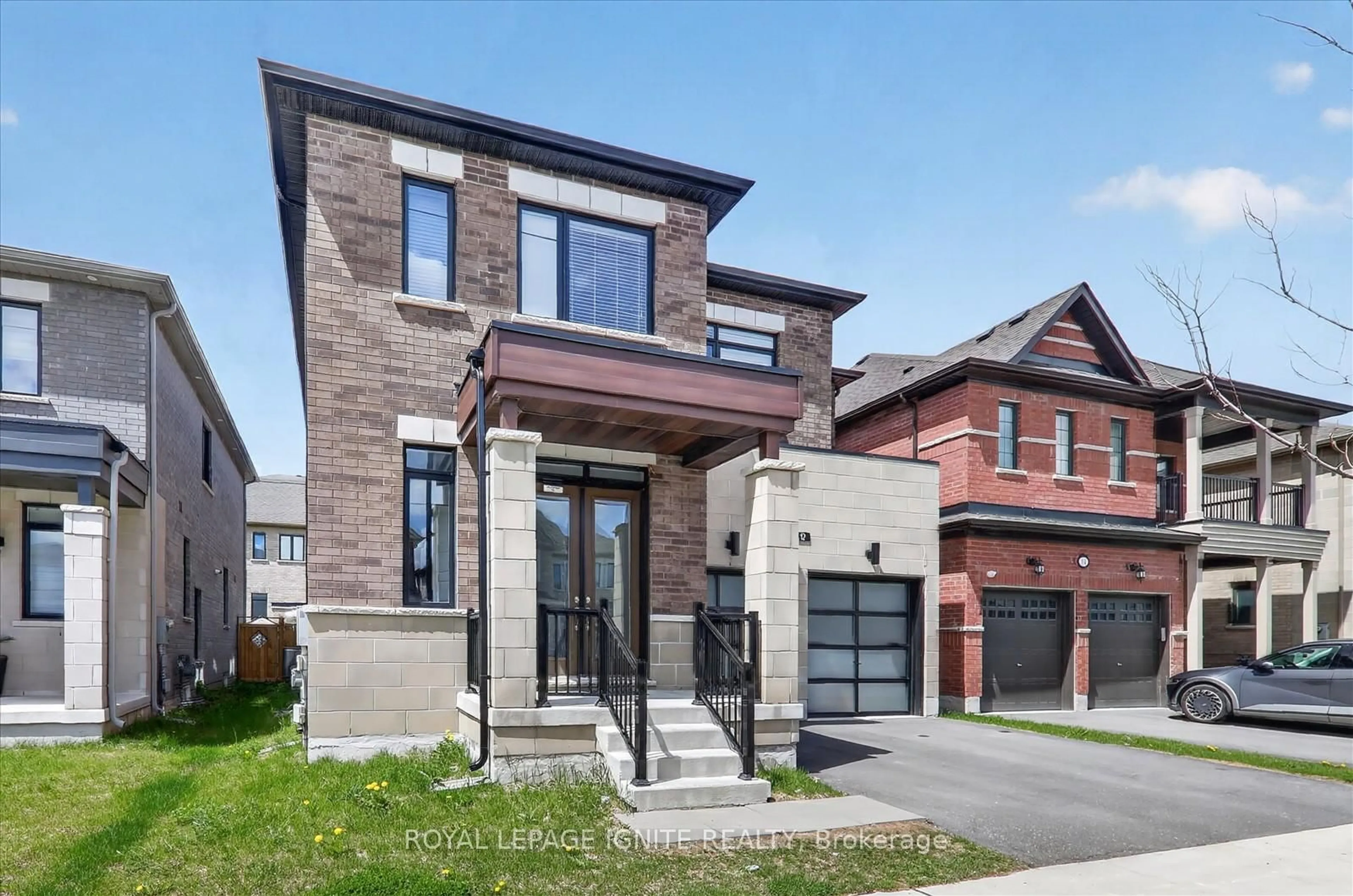 Home with brick exterior material, street for 12 Nigh Dr, Markham Ontario L3S 0G4