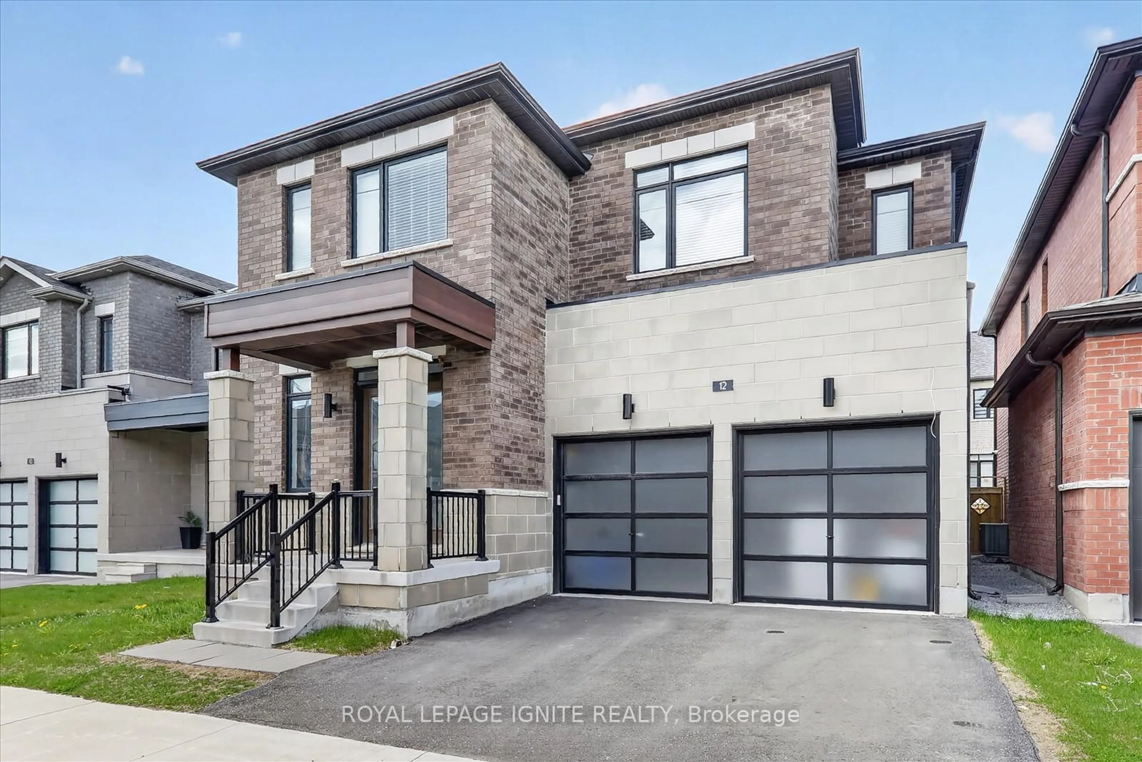 Home with brick exterior material, street for 12 Nigh Dr, Markham Ontario L3S 0G4