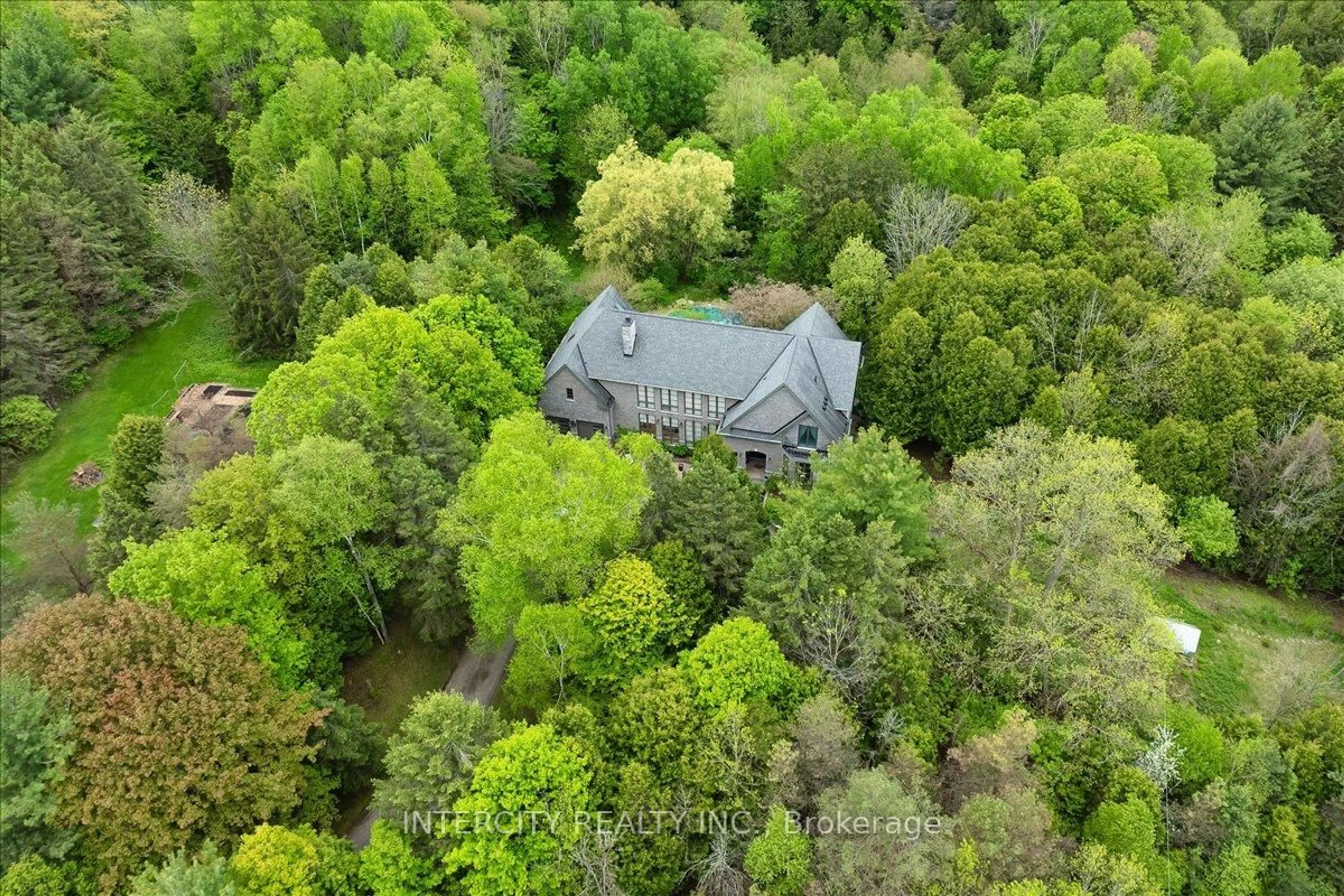 A pic from outside/outdoor area/front of a property/back of a property/a pic from drone, forest/trees view for 15600 7th Concession Rd, King Ontario L7B 0G4