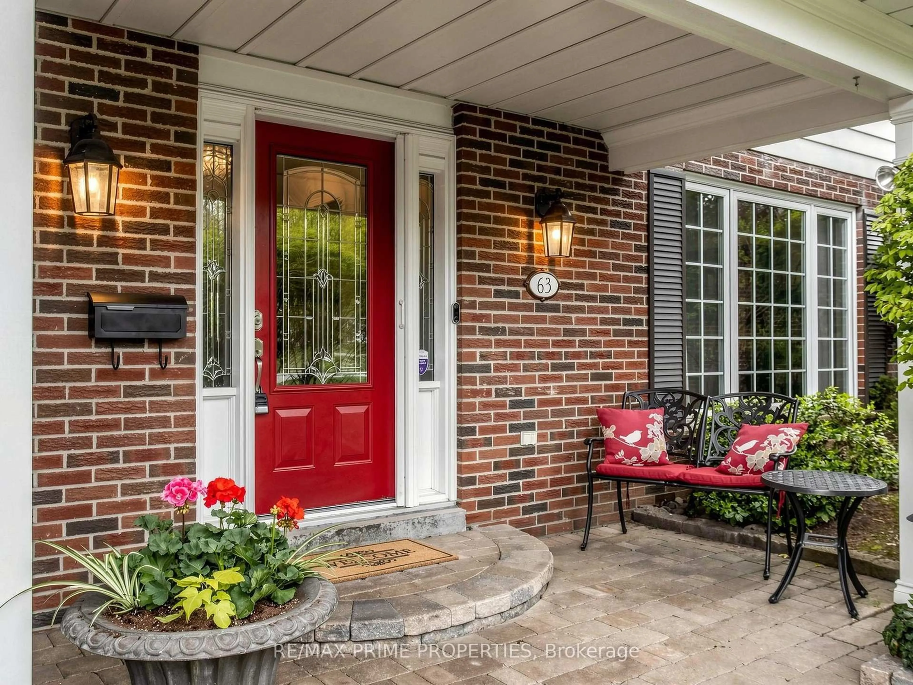 Home with brick exterior material, street for 63 Walkerton Dr, Markham Ontario L3P 1H9
