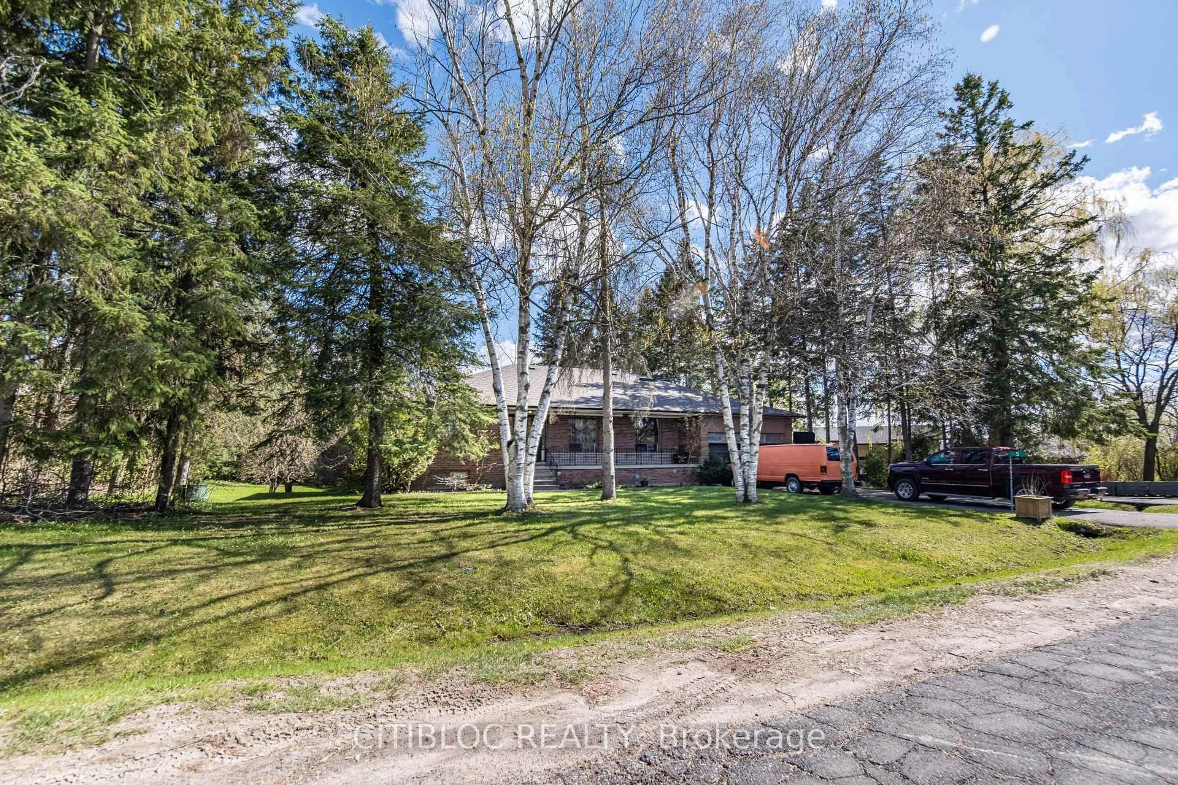 A pic from outside/outdoor area/front of a property/back of a property/a pic from drone, forest/trees view for 5 Old Forge Rd, King Ontario L7B 1K4