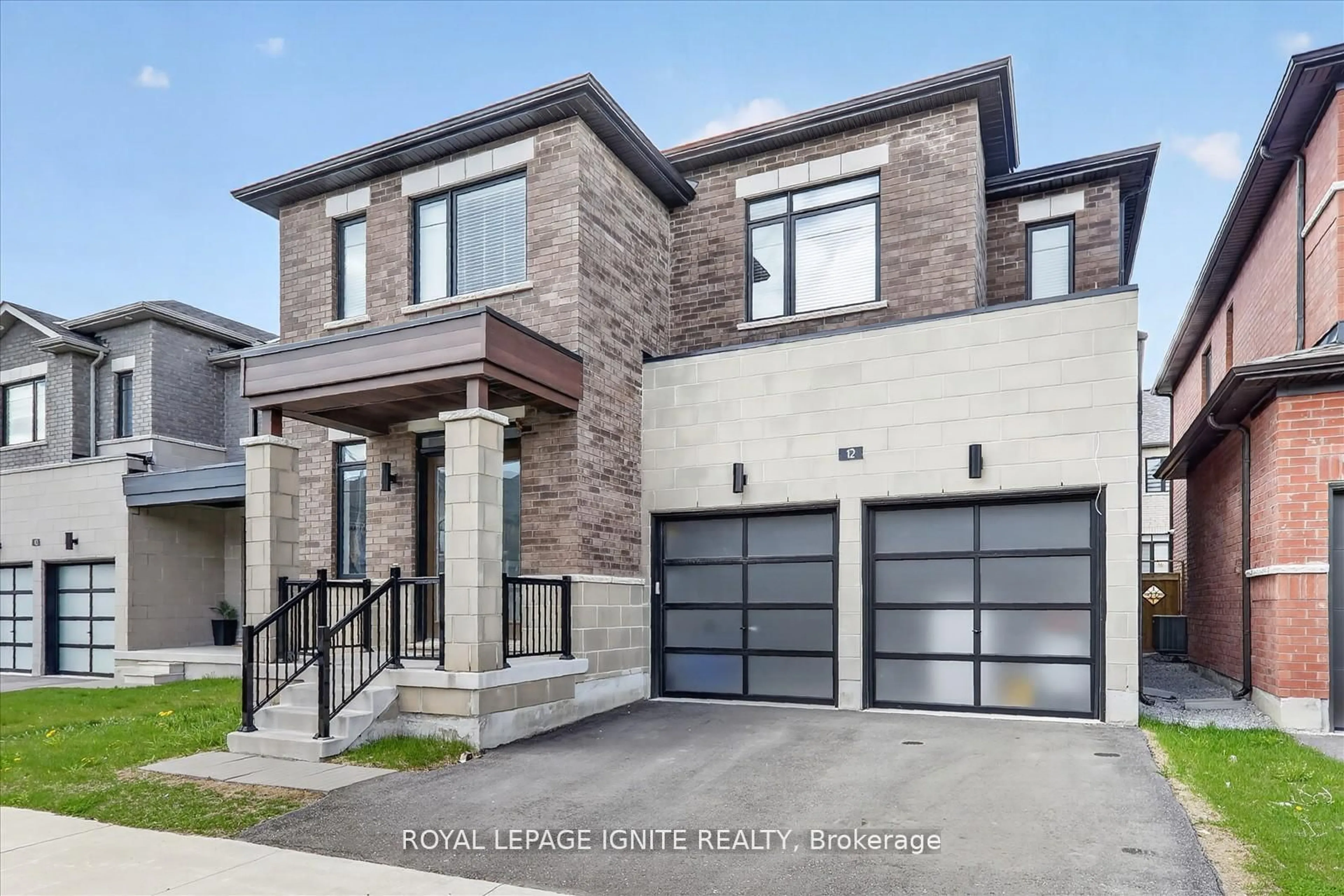 Home with brick exterior material, street for 12 Nigh Dr, Markham Ontario L3S 0G4