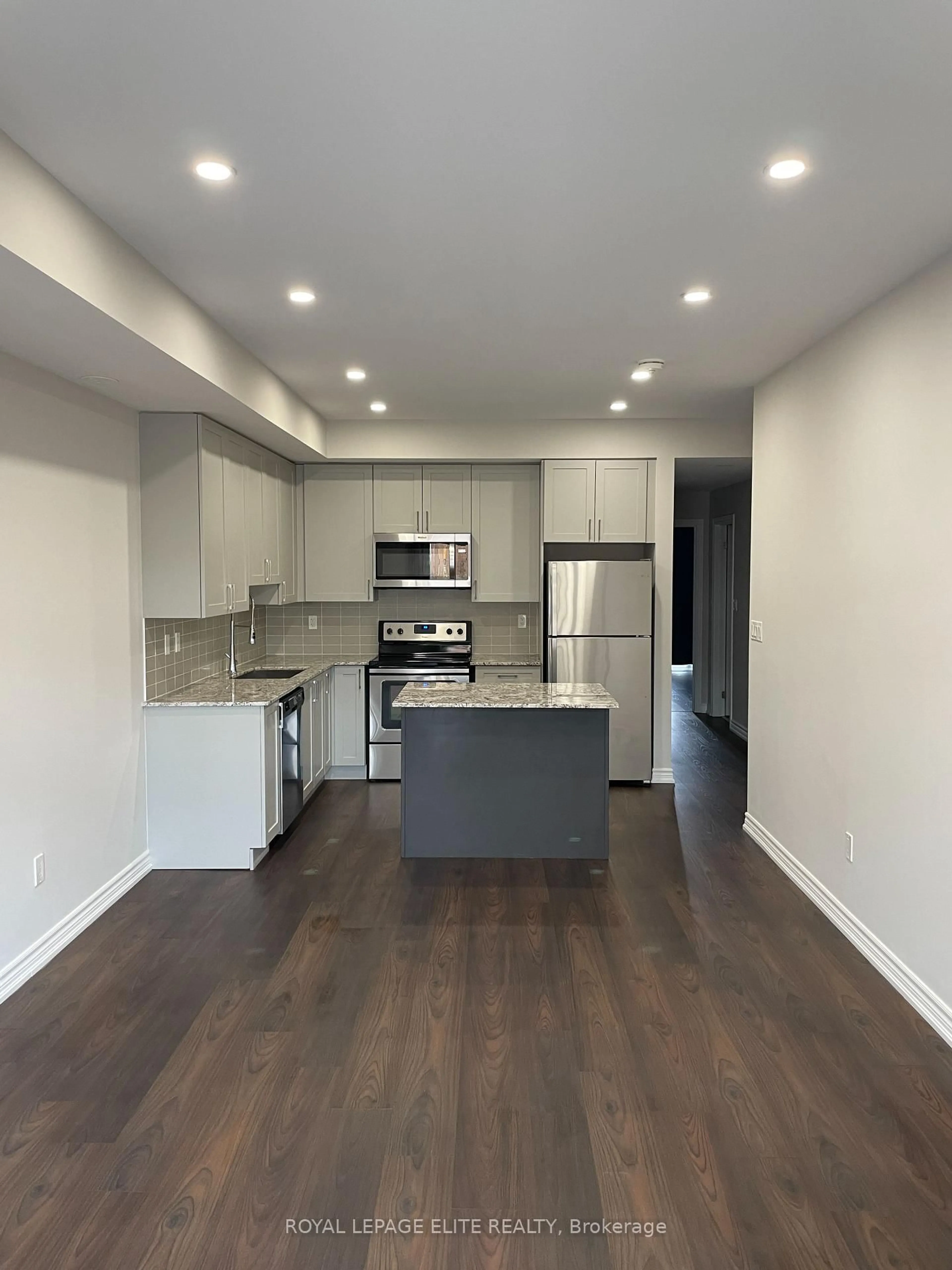 Open concept kitchen, wood/laminate floor for 198 Pine Grove Rd #06, Vaughan Ontario L4L 1X3