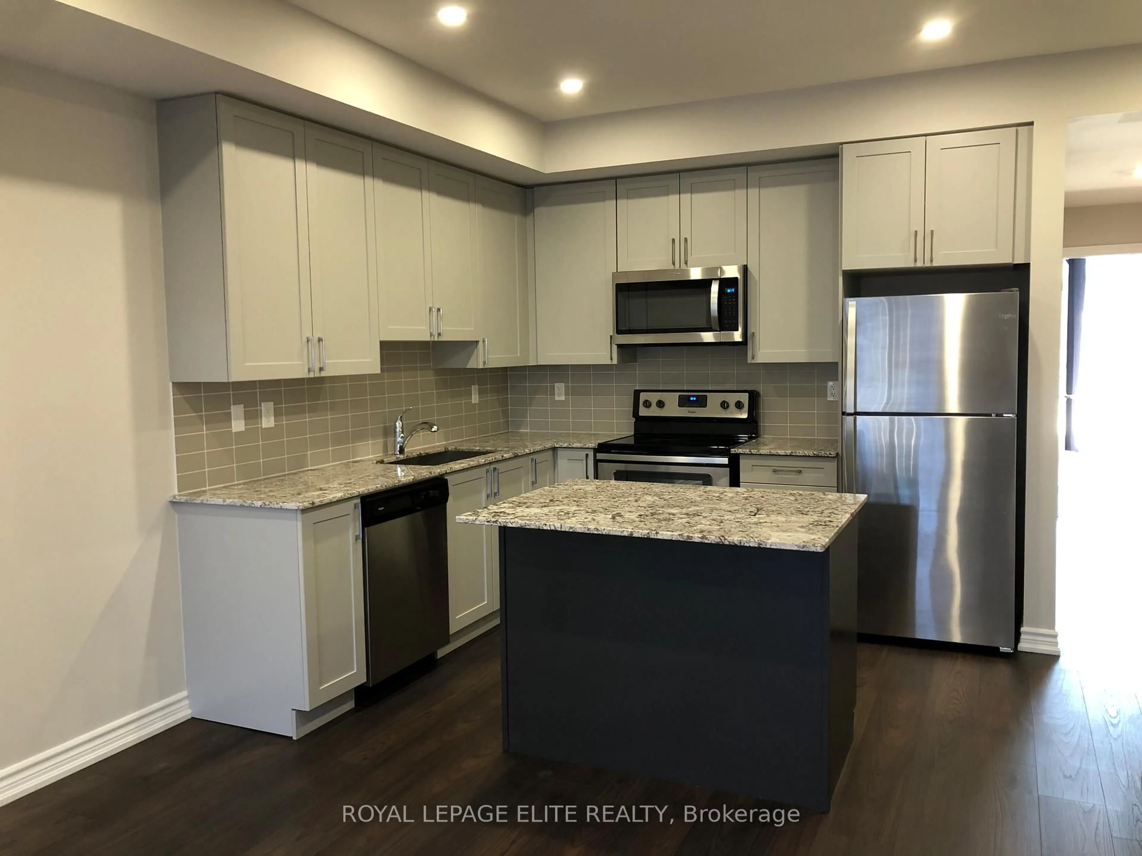 Open concept kitchen, wood/laminate floor for 198 Pine Grove Rd #06, Vaughan Ontario L4L 1X3