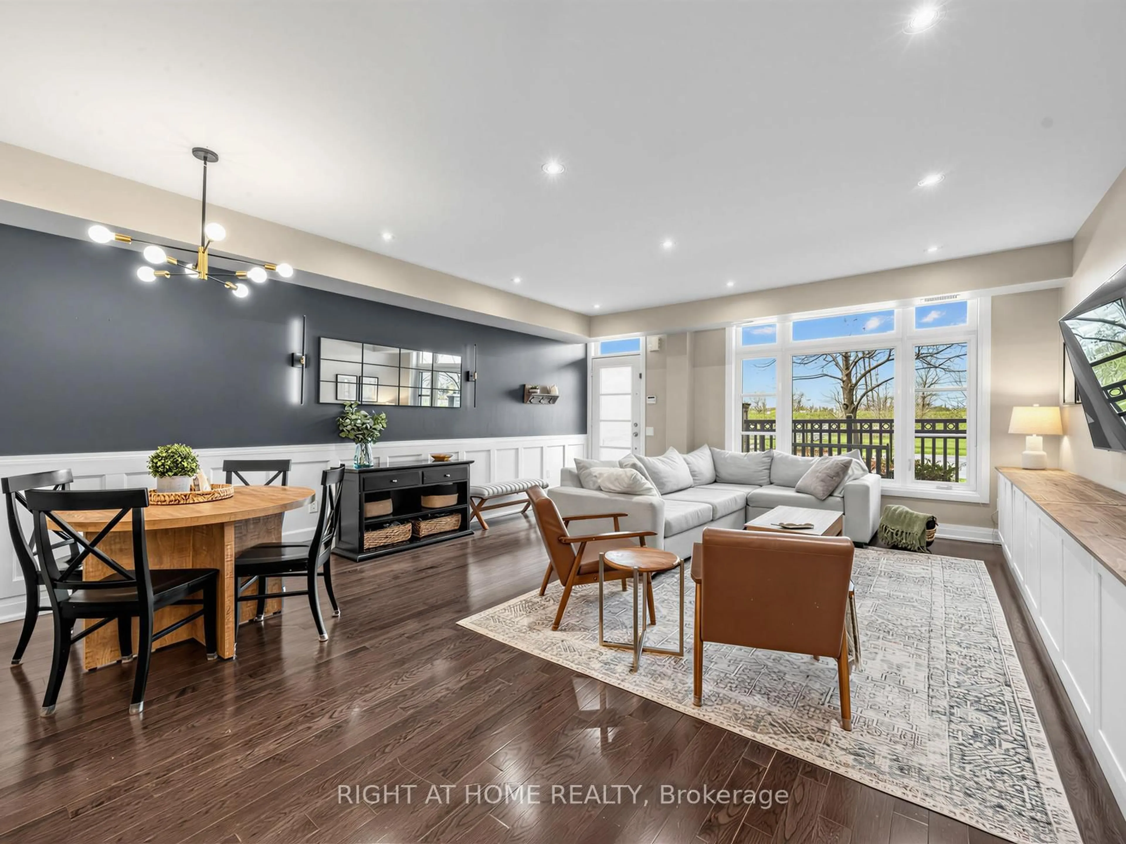 Living room with furniture, wood/laminate floor for 8177 Kipling Ave #61, Vaughan Ontario L4L 2A3