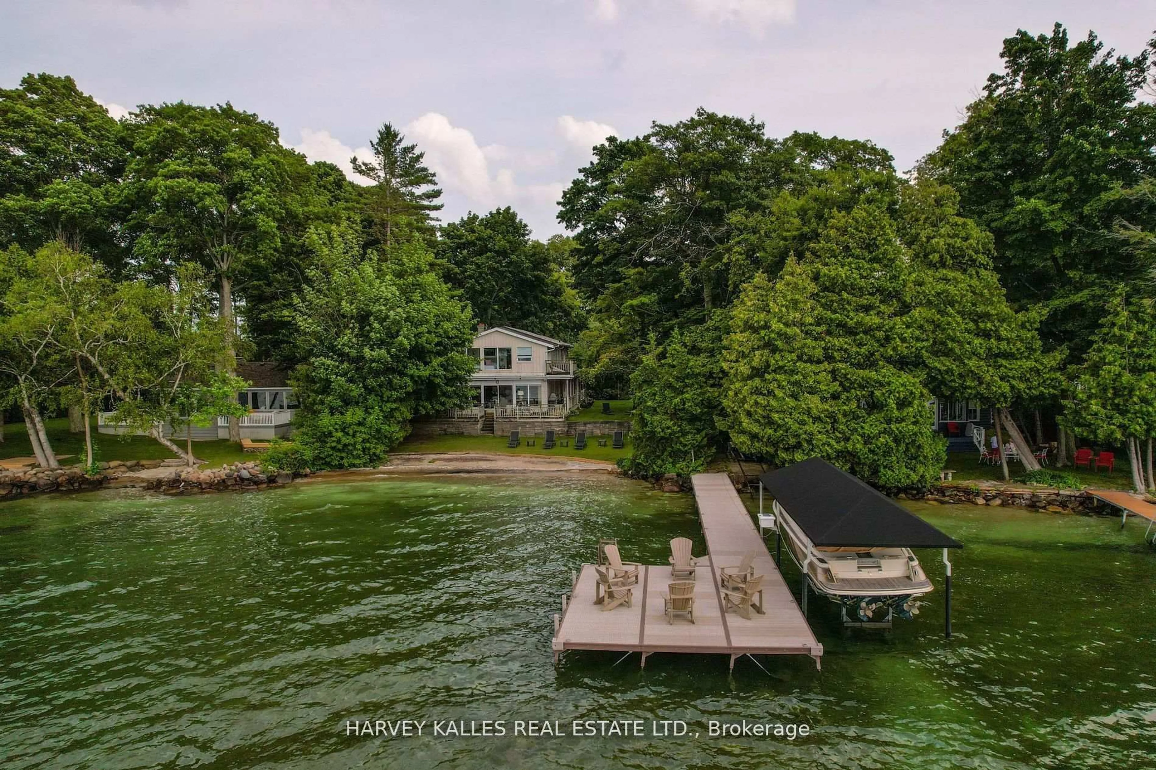 A pic from outside/outdoor area/front of a property/back of a property/a pic from drone, water/lake/river/ocean view for 22 Gooch Park Dr, Innisfil Ontario L9S 2S6