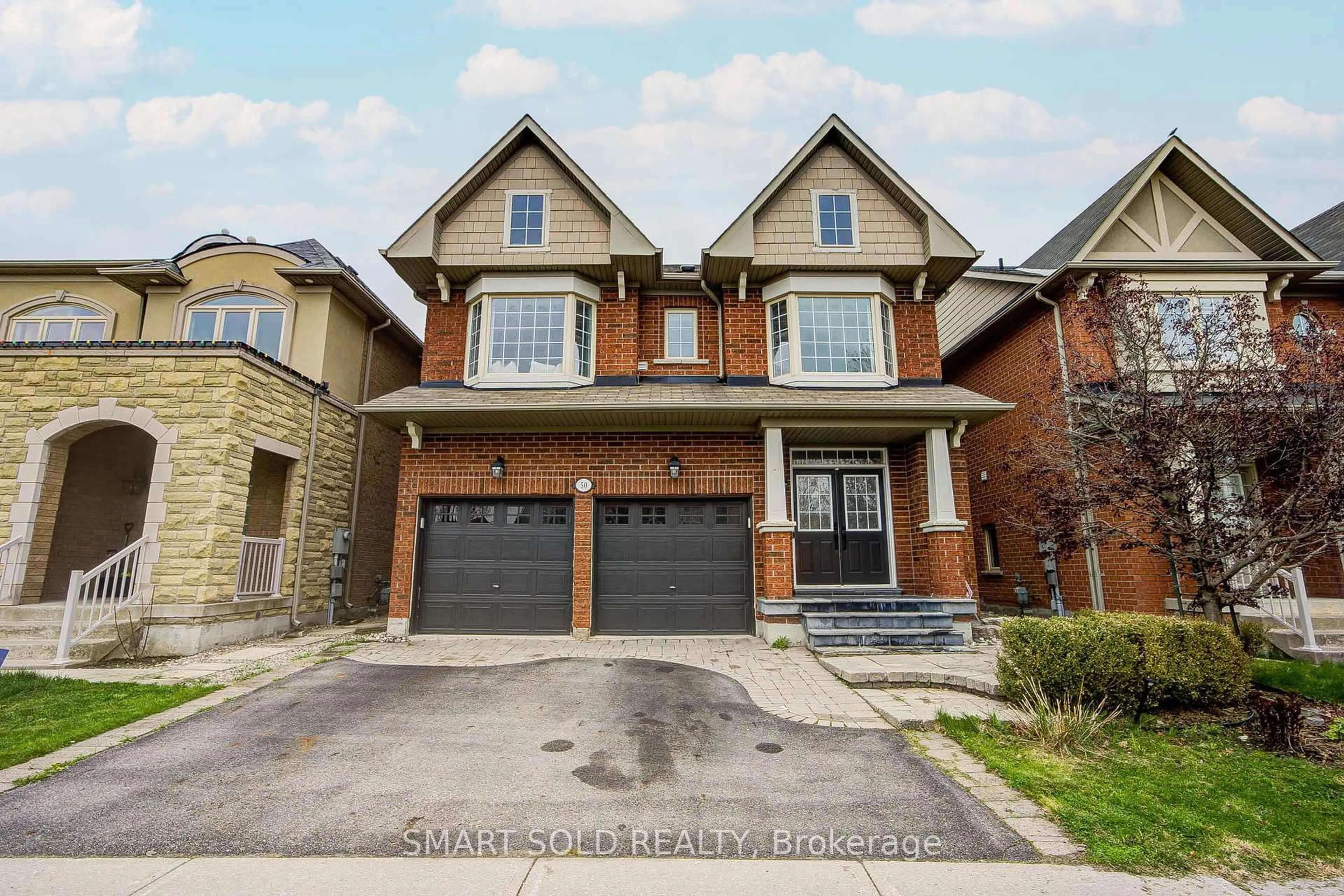 Home with brick exterior material, street for 50 Brumstead Dr, Richmond Hill Ontario L4E 4Y6