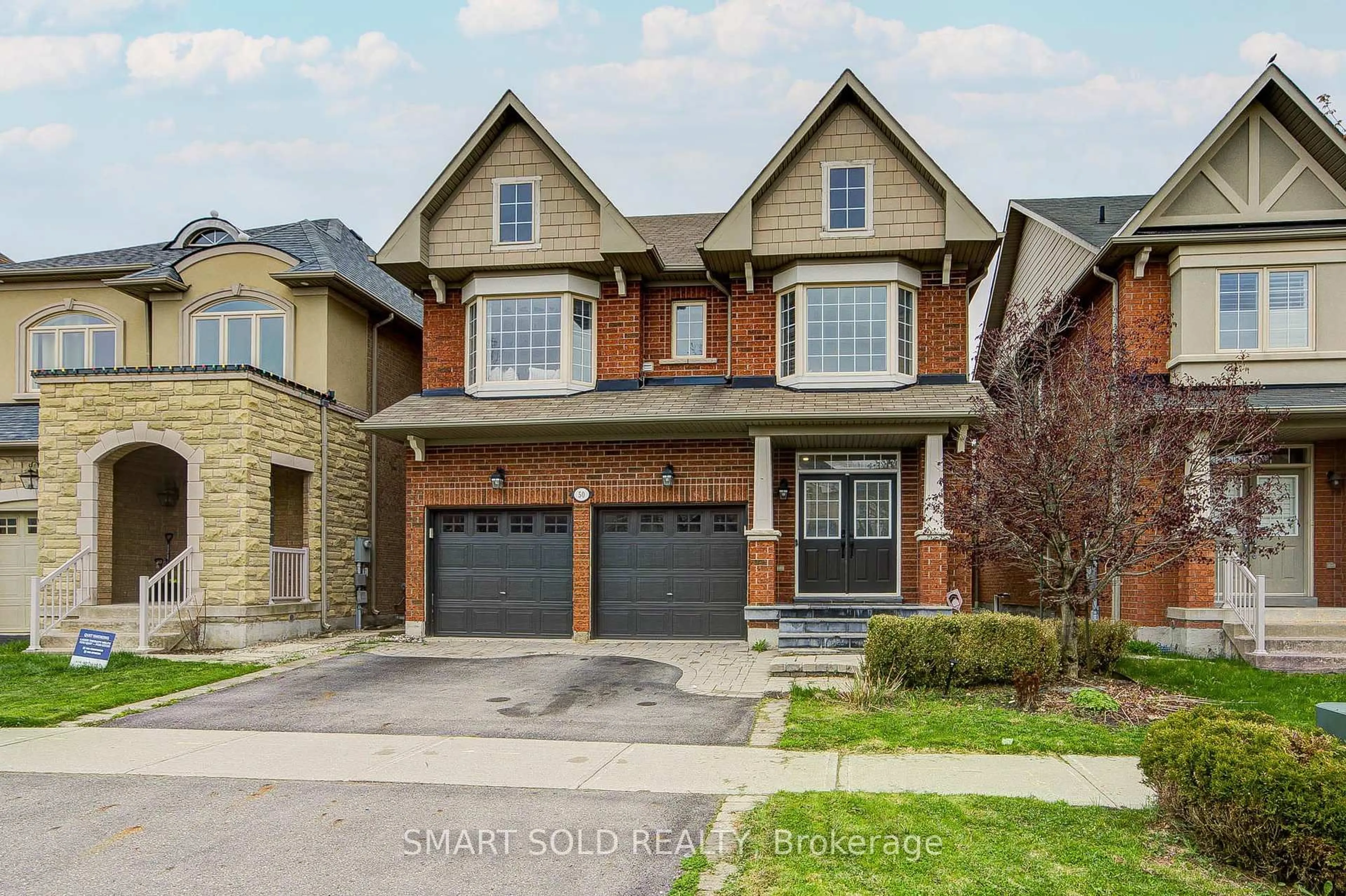 Home with brick exterior material, street for 50 Brumstead Dr, Richmond Hill Ontario L4E 4Y6