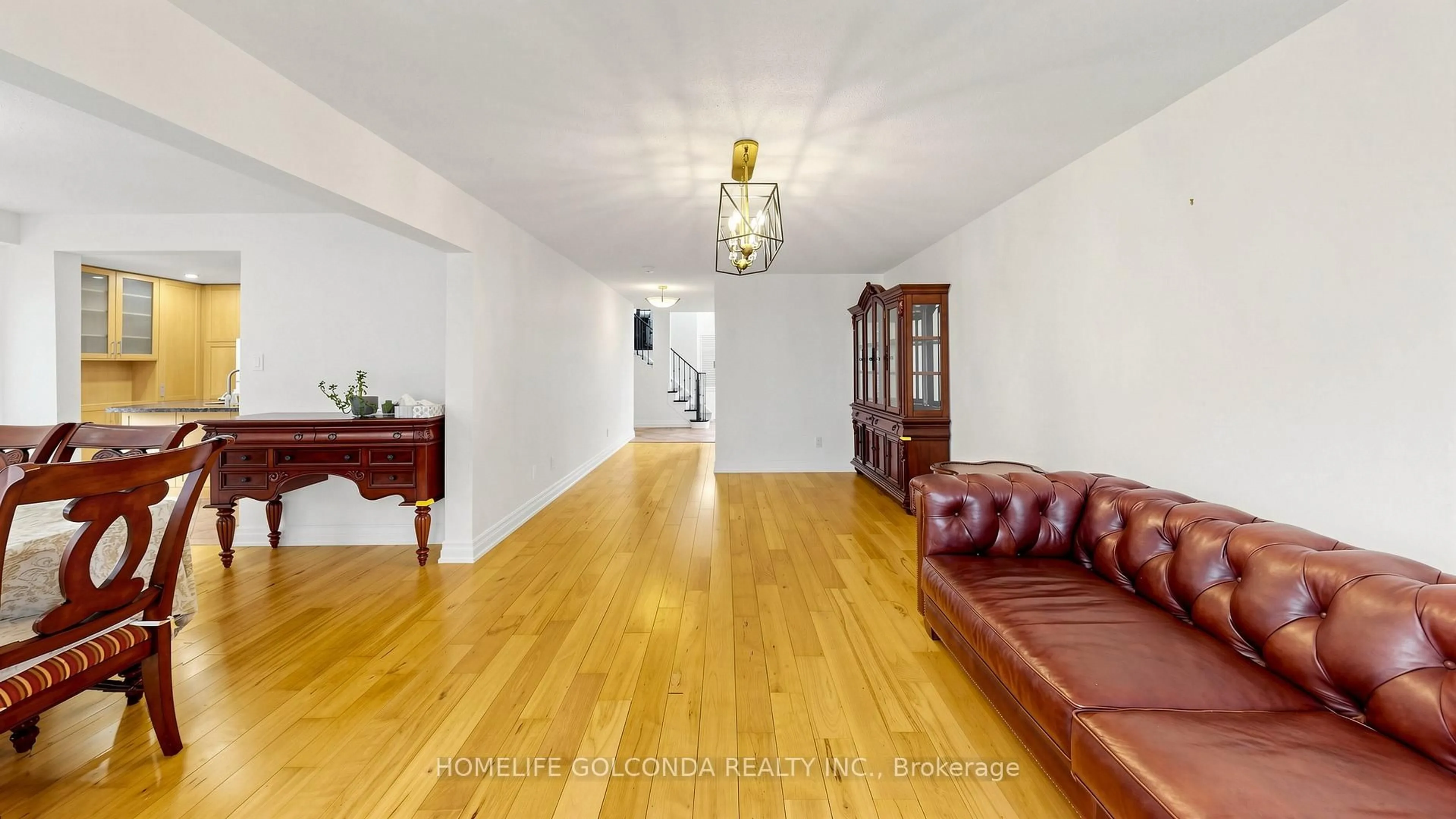 Living room with furniture, wood/laminate floor for 19 Thornbury Circ, Vaughan Ontario L4J 5C1