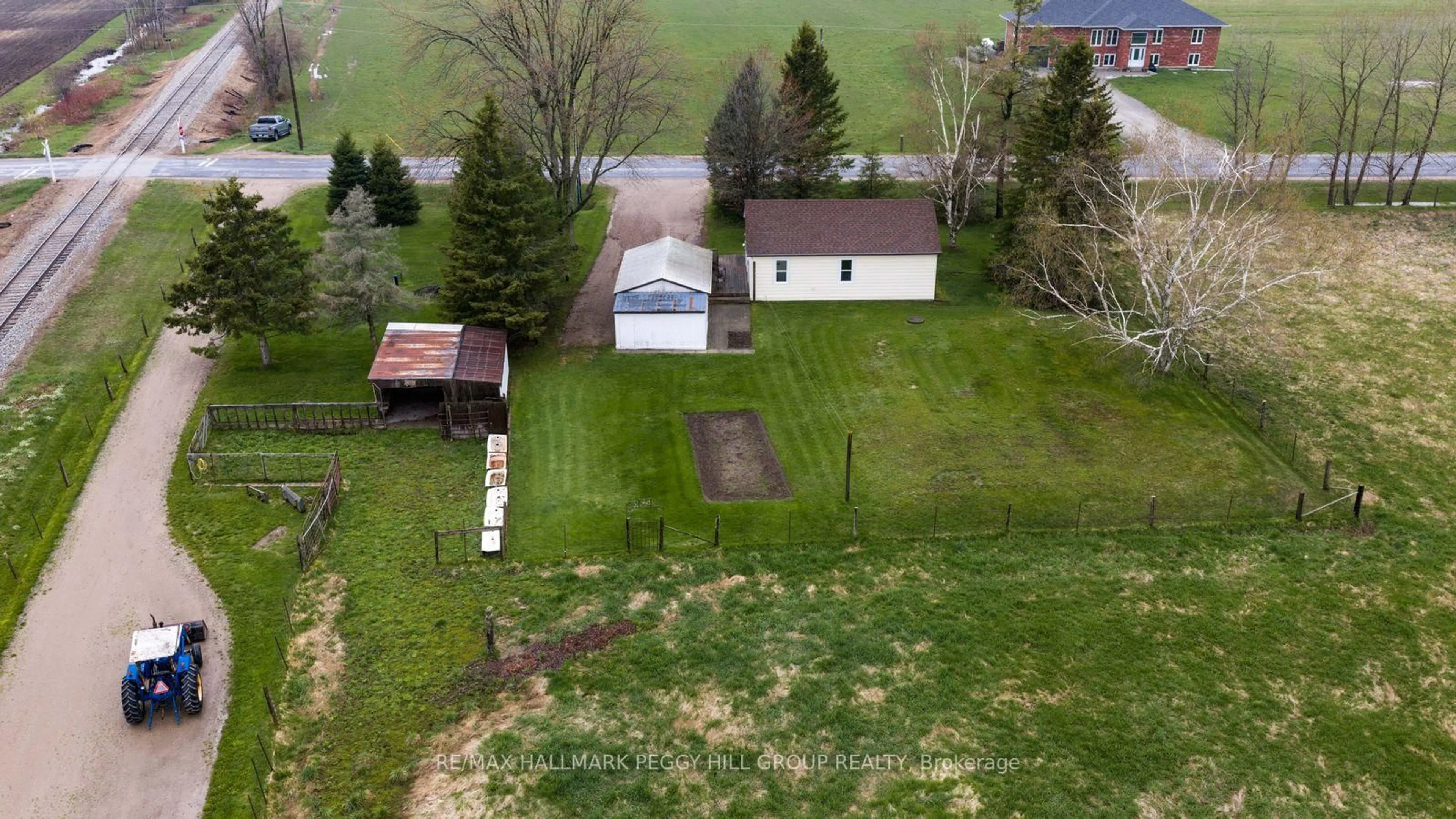 A pic from outside/outdoor area/front of a property/back of a property/a pic from drone, street for 8785 10th Line, Essa Ontario L4M 4S4