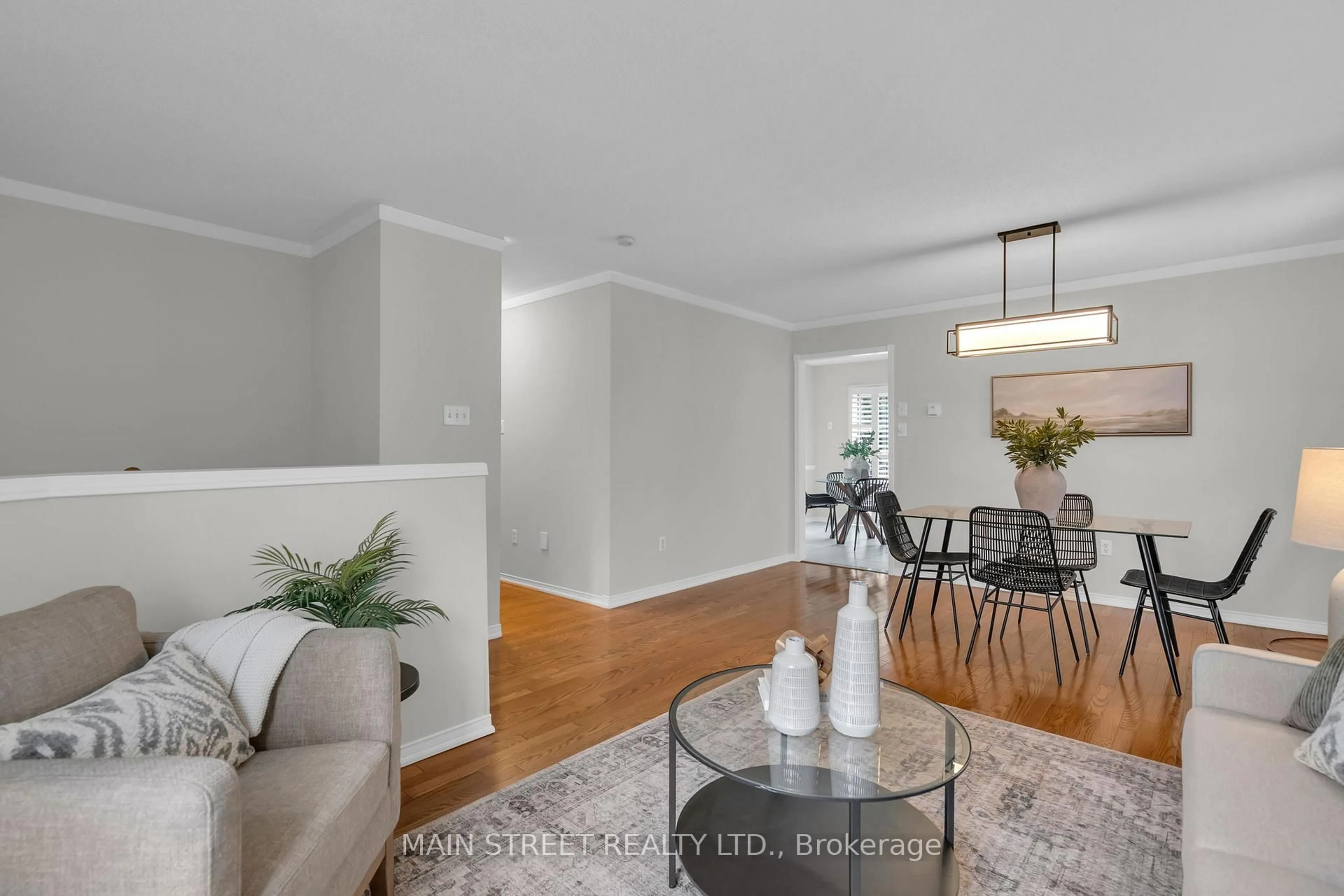 Living room with furniture, wood/laminate floor for 137 Clearmeadow Blvd, Newmarket Ontario L3X 2E9
