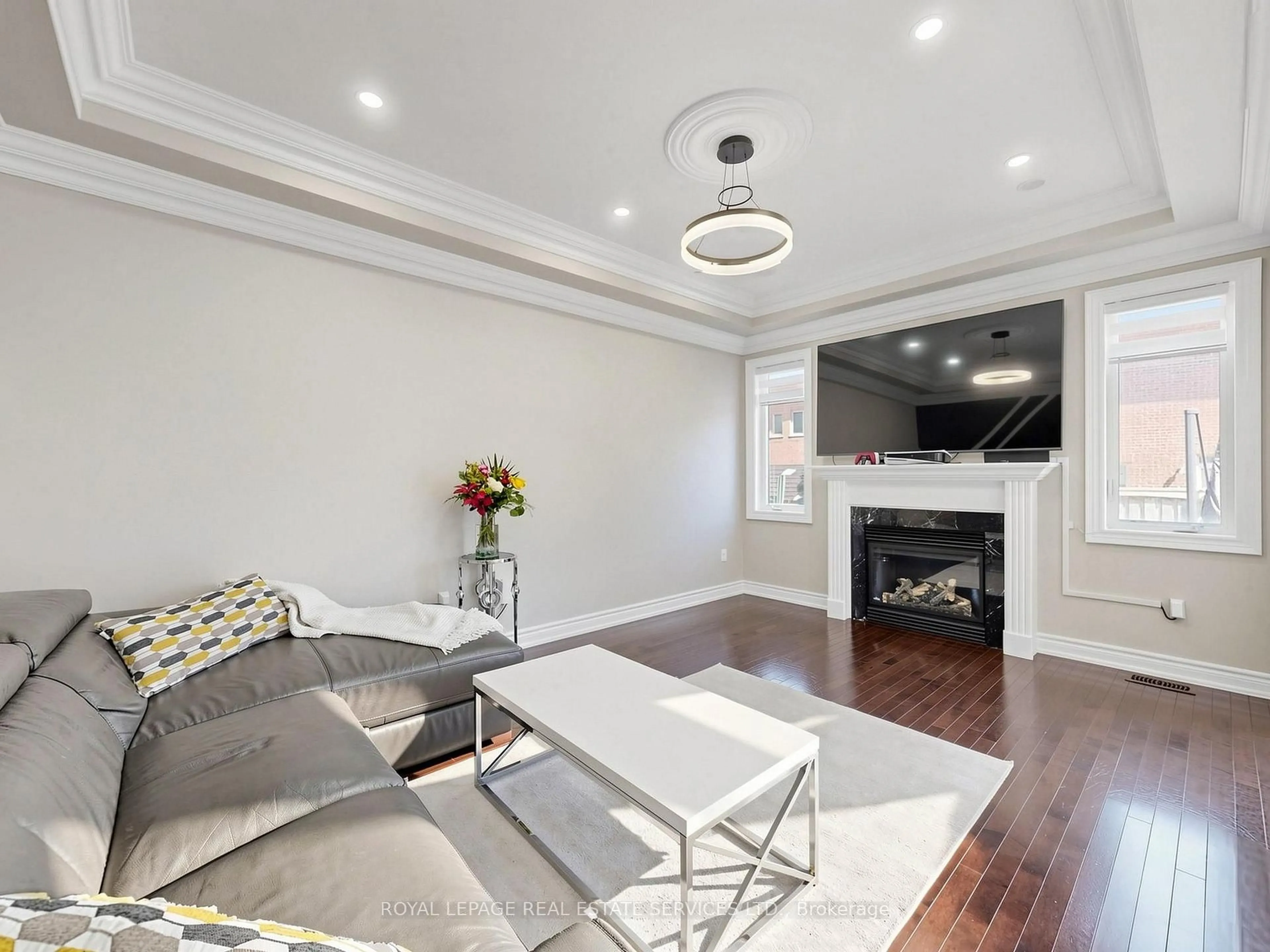 Living room with furniture, wood/laminate floor for 1158 Atkins Dr, Newmarket Ontario L3X 0A6