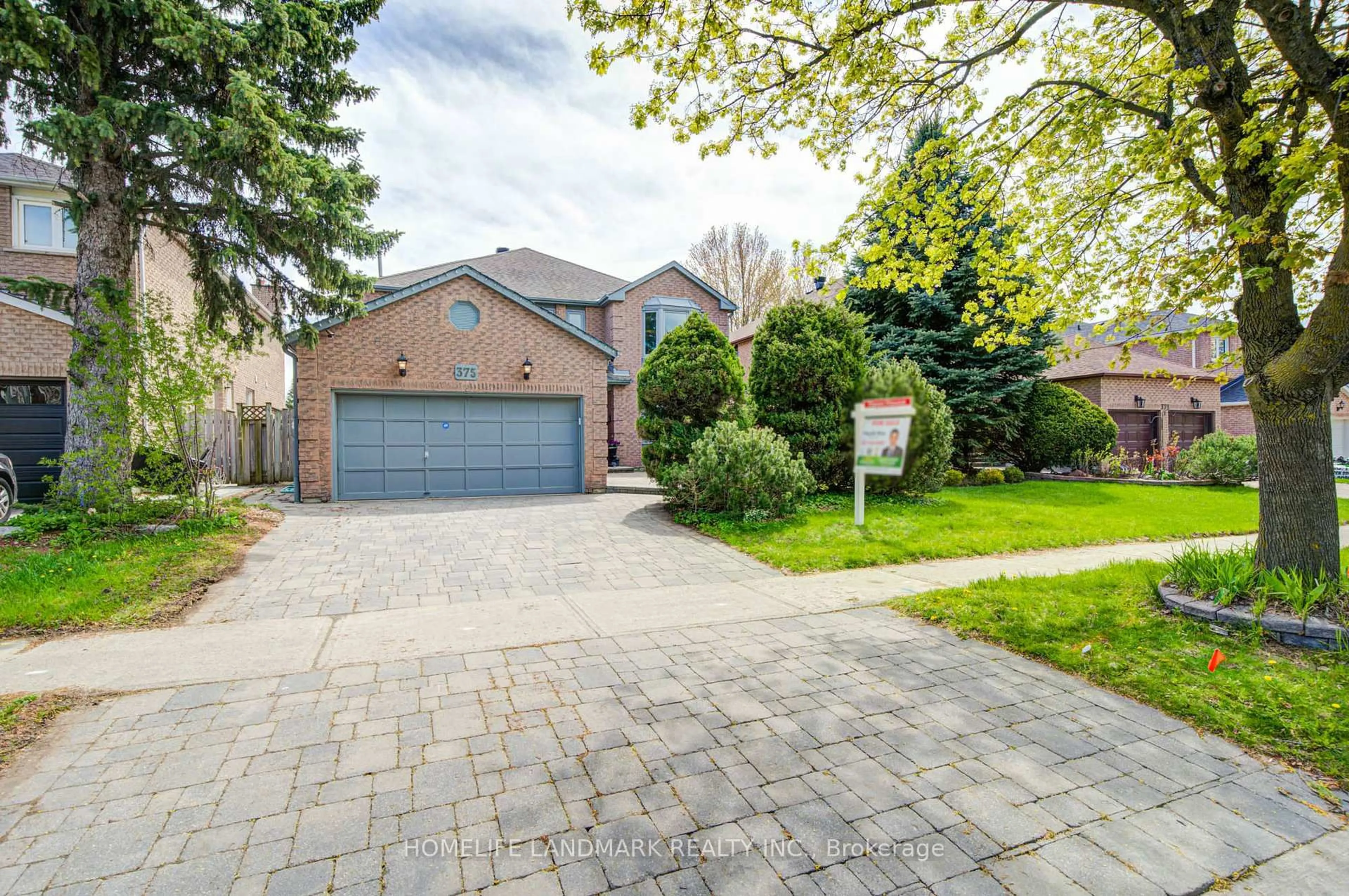 Home with brick exterior material, street for 375 Manhattan Dr, Markham Ontario L3P 7J2