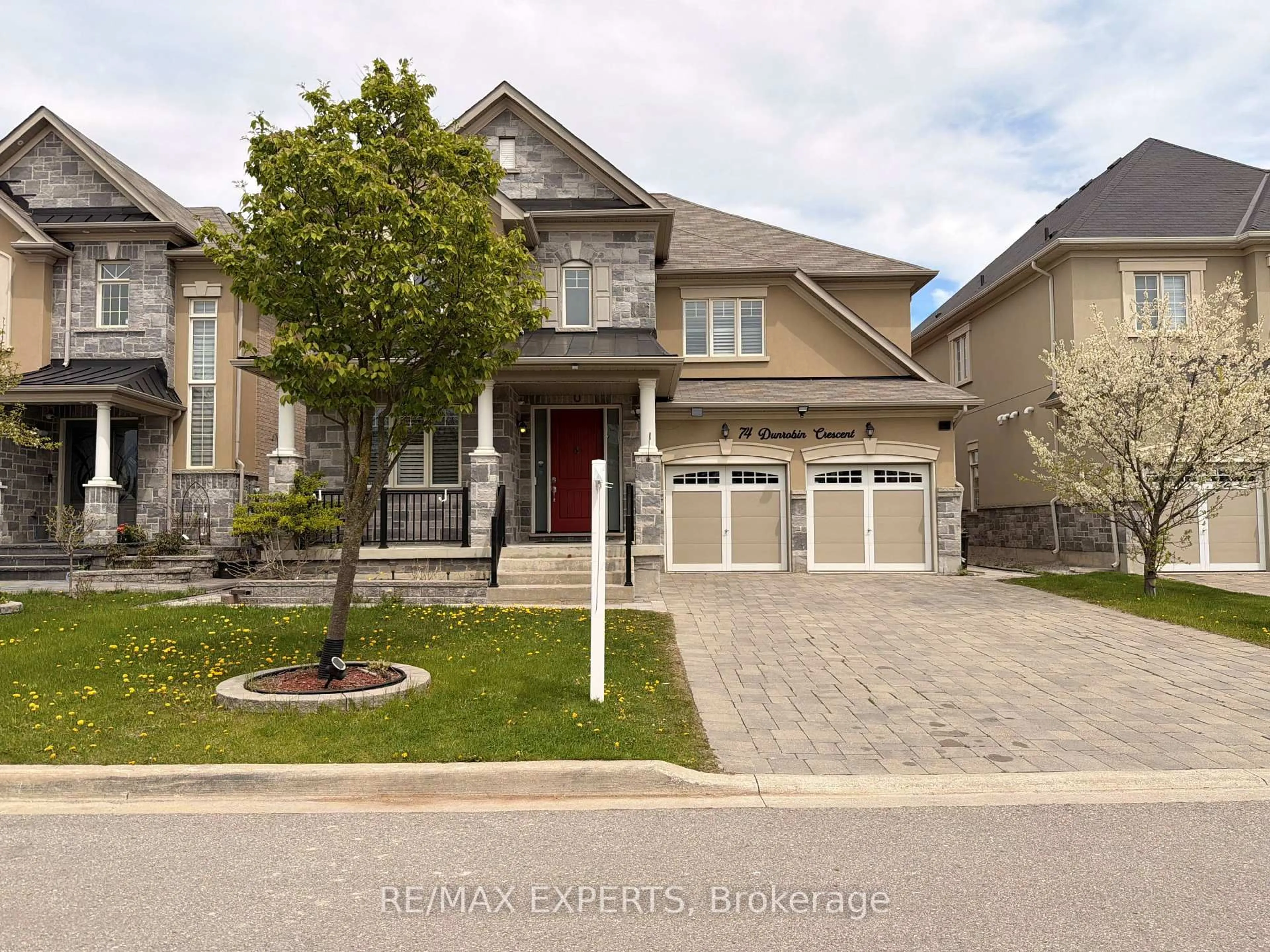 Home with brick exterior material, street for 74 Dunrobin Cres, Vaughan Ontario L4H 4A9