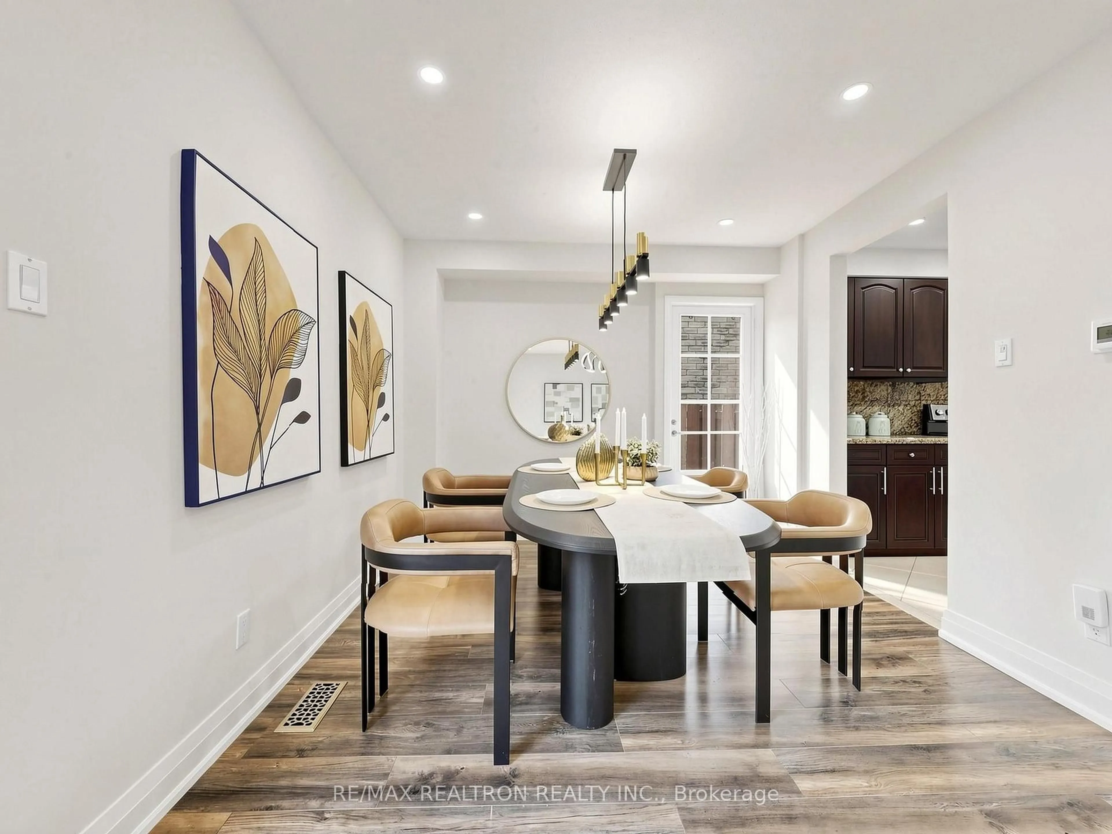 Dining room, wood/laminate floor for 16 Foxglove Crt, Markham Ontario L3R 3Y3